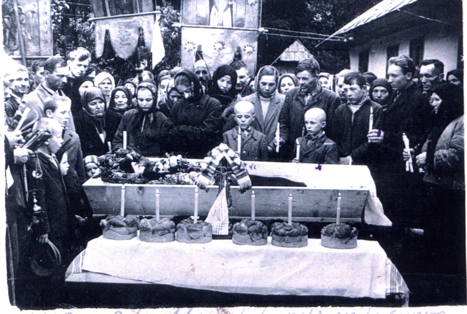 Looking for any information on names, dates, place for this photo. Source was from Steve Shewchuk but his original source image was unknown. Likely old country Bukovina, Ukraine, but that's about all we know. Restoration pending
