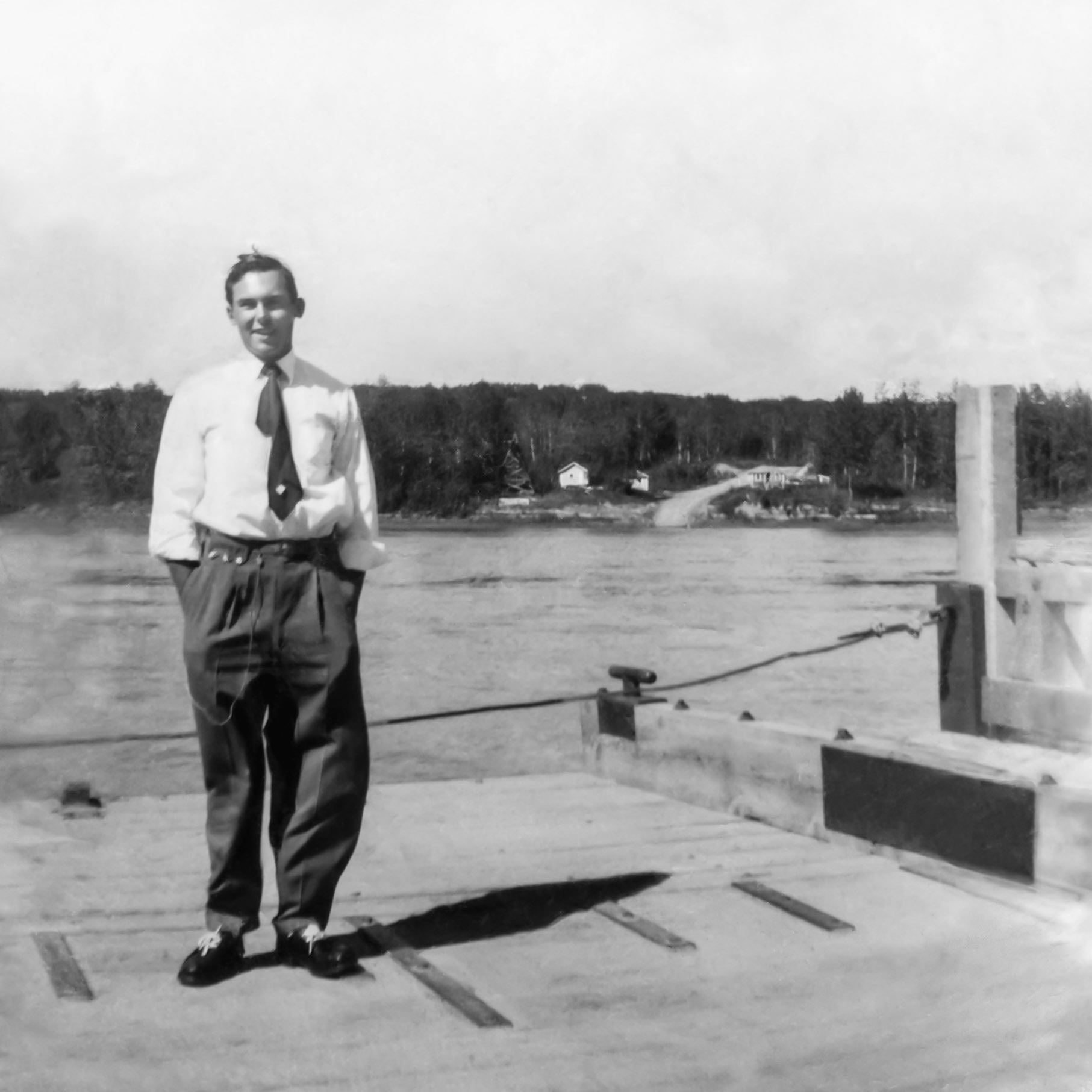 Circa 1955 • John Huculak (22) on the Desjarlais Ferry, crossing the North Saskatchewan River, near Willingdon, AB.