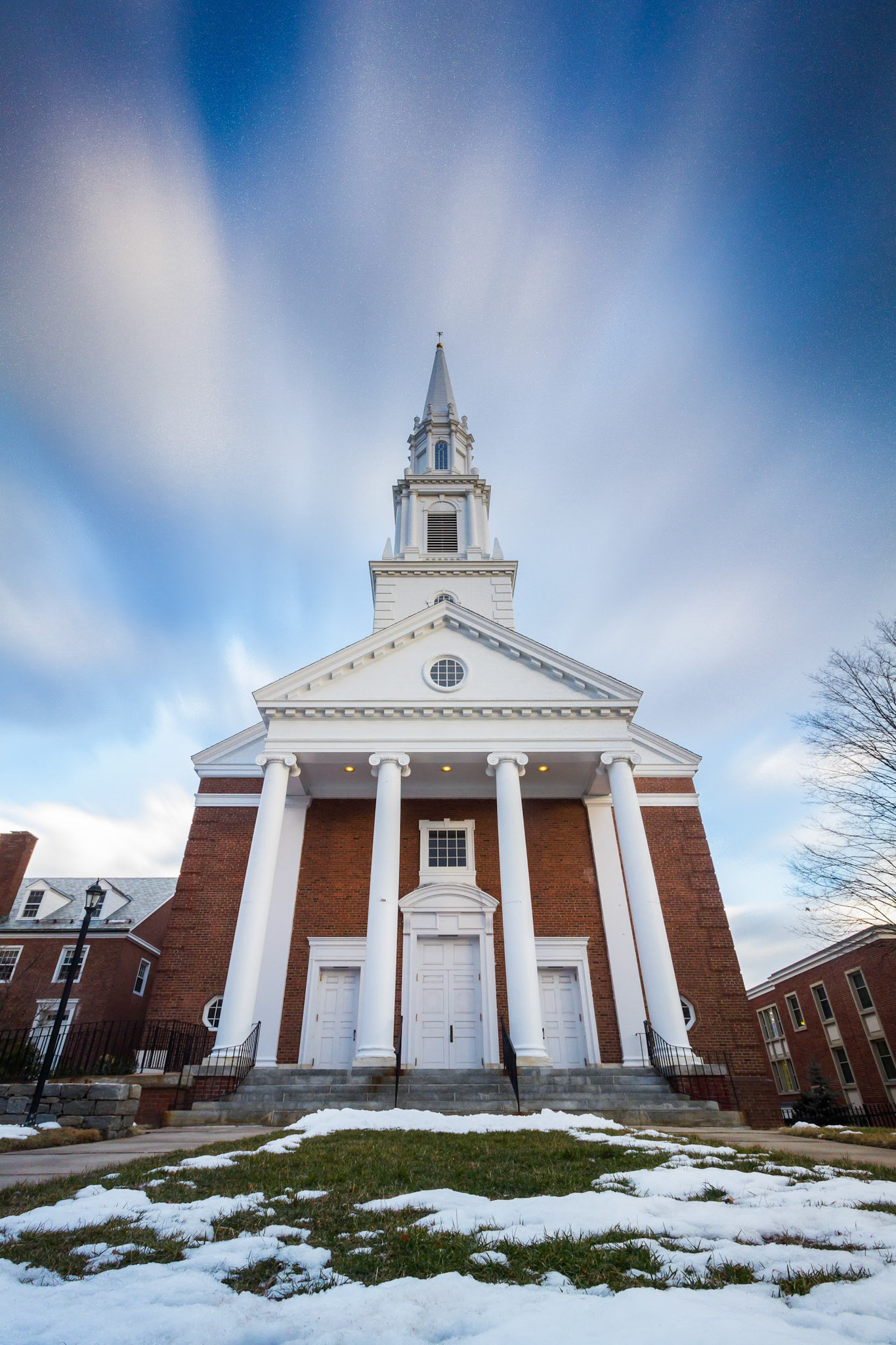 Long exposure with clouds behind church steeple in Hartford, Connecticut.