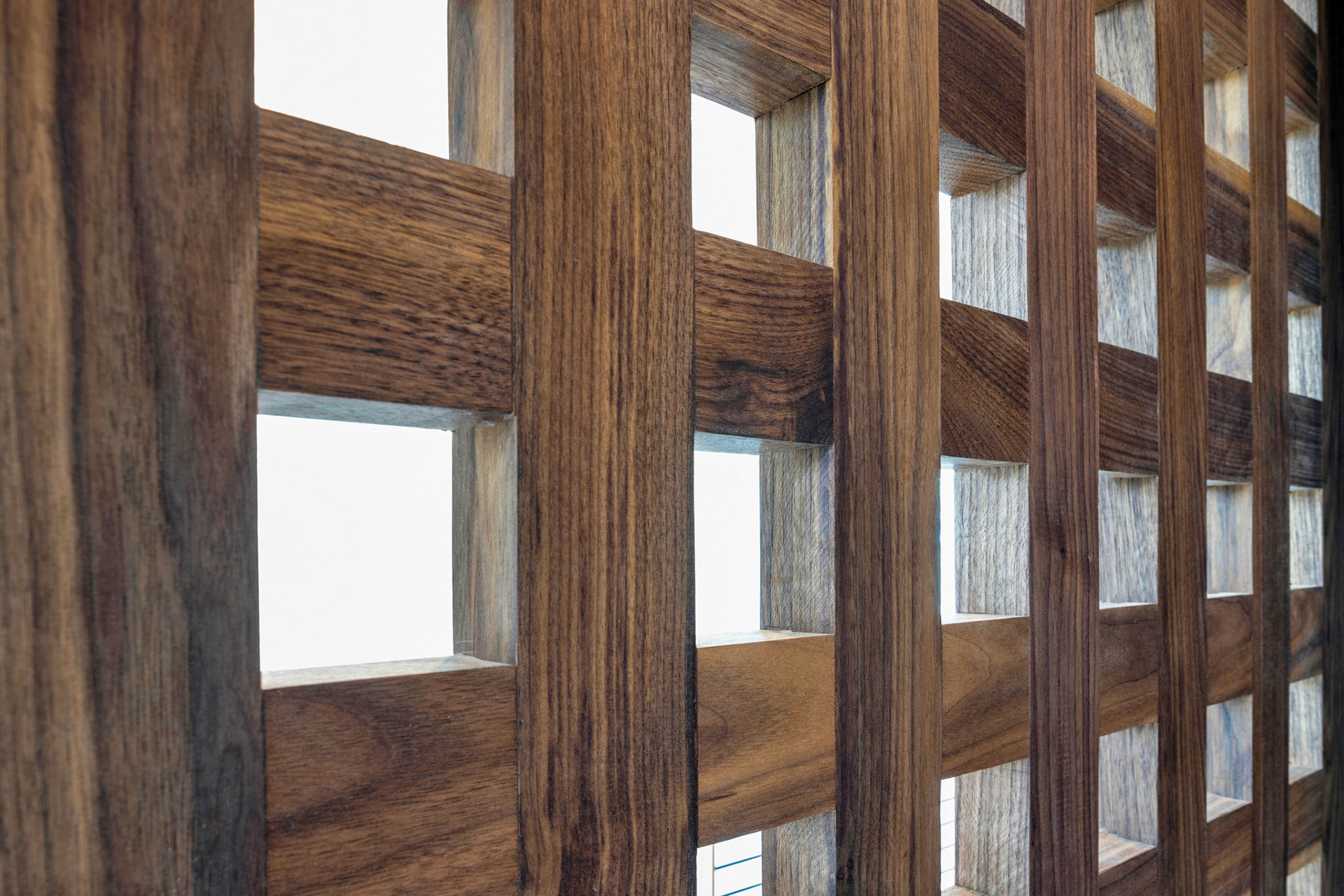 Custom built sliding barn-door entrance to wine room.
