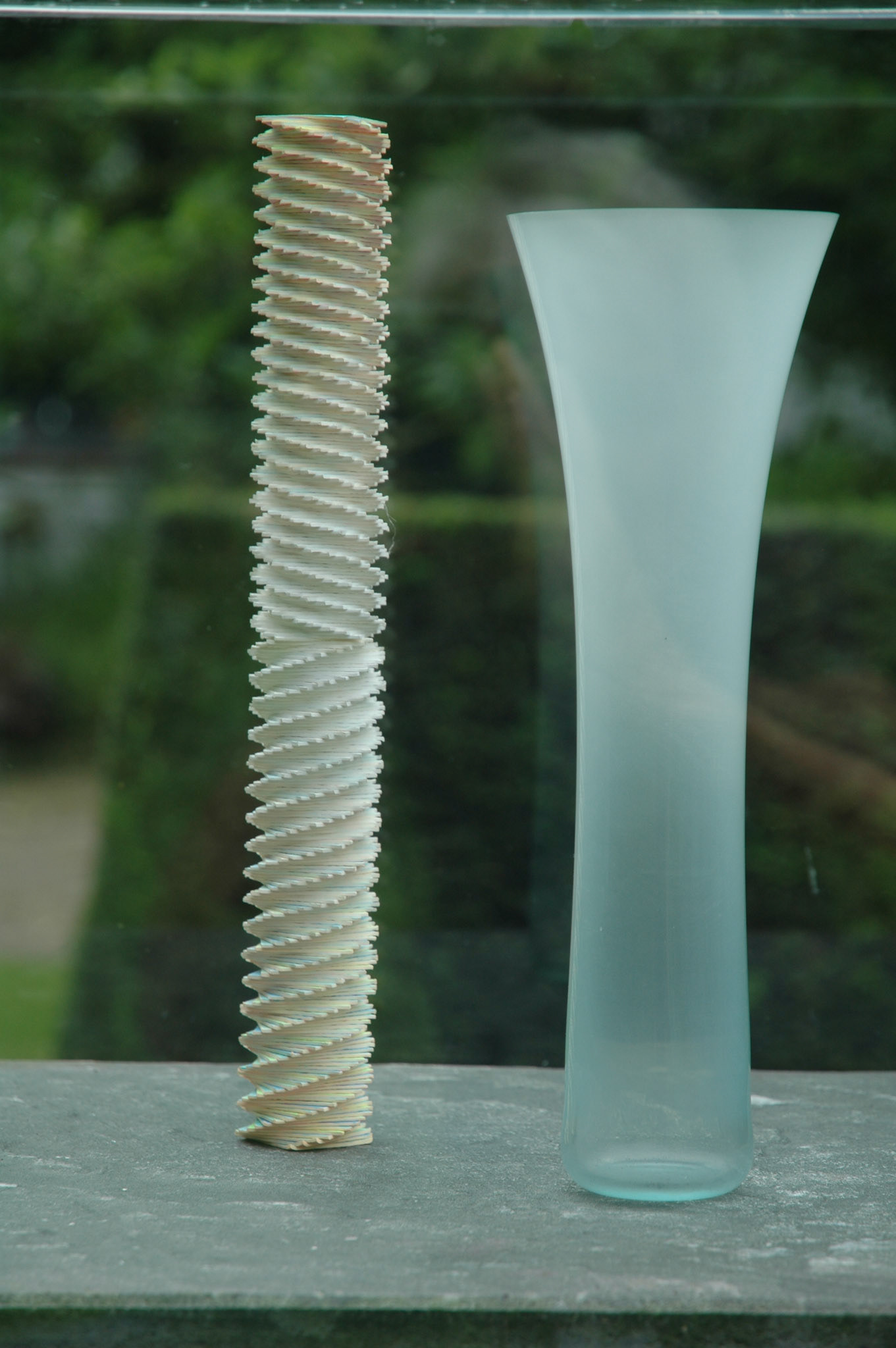Paper sculpture and glass sculpture by Bert Frijns