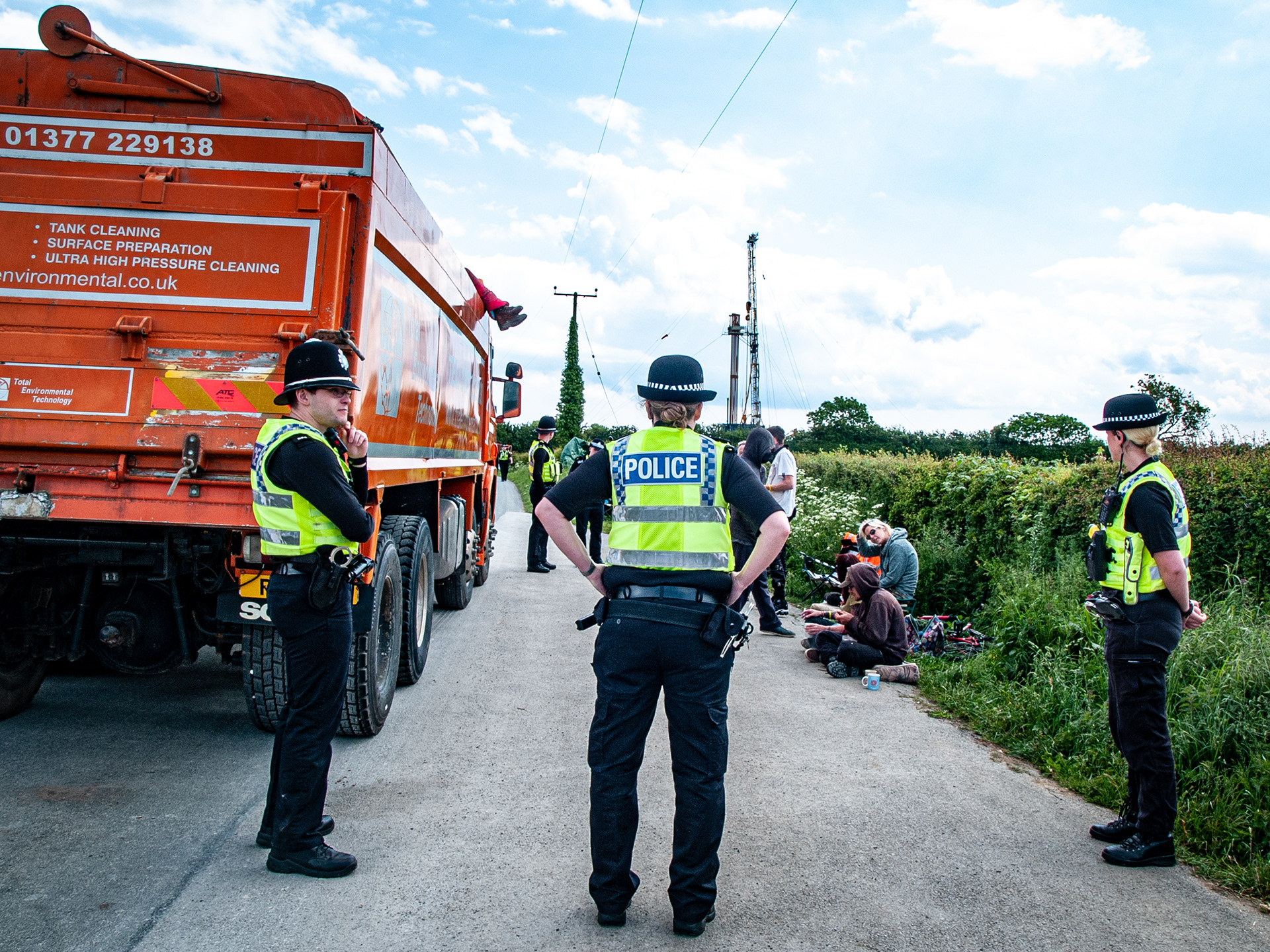 Police on guard to prevent food or water being passed to a protester