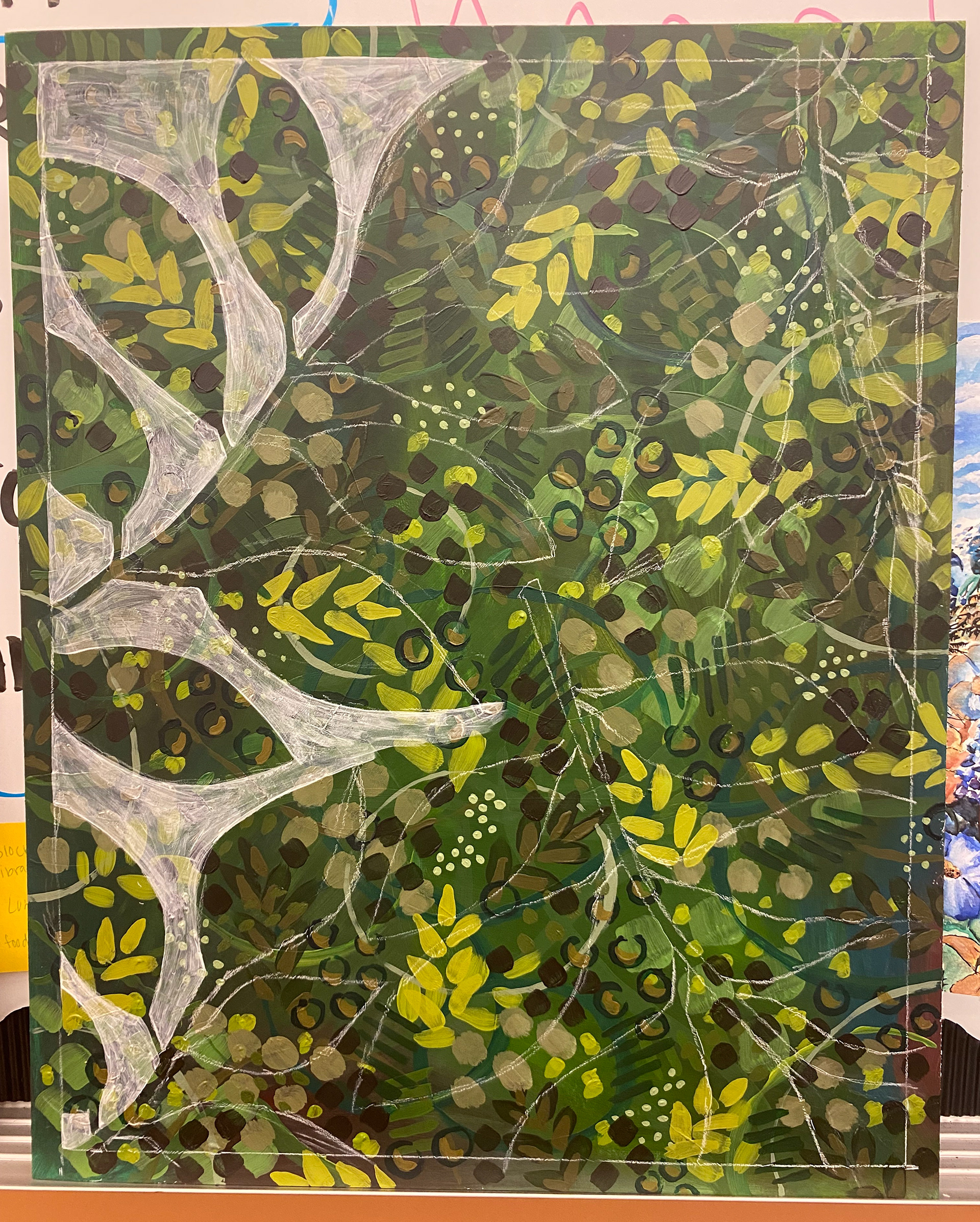 With white charcoal I sketched leaves and branch shapes, then used clear medium acrylic and white acrylic mixed together to paint in negative sapces.