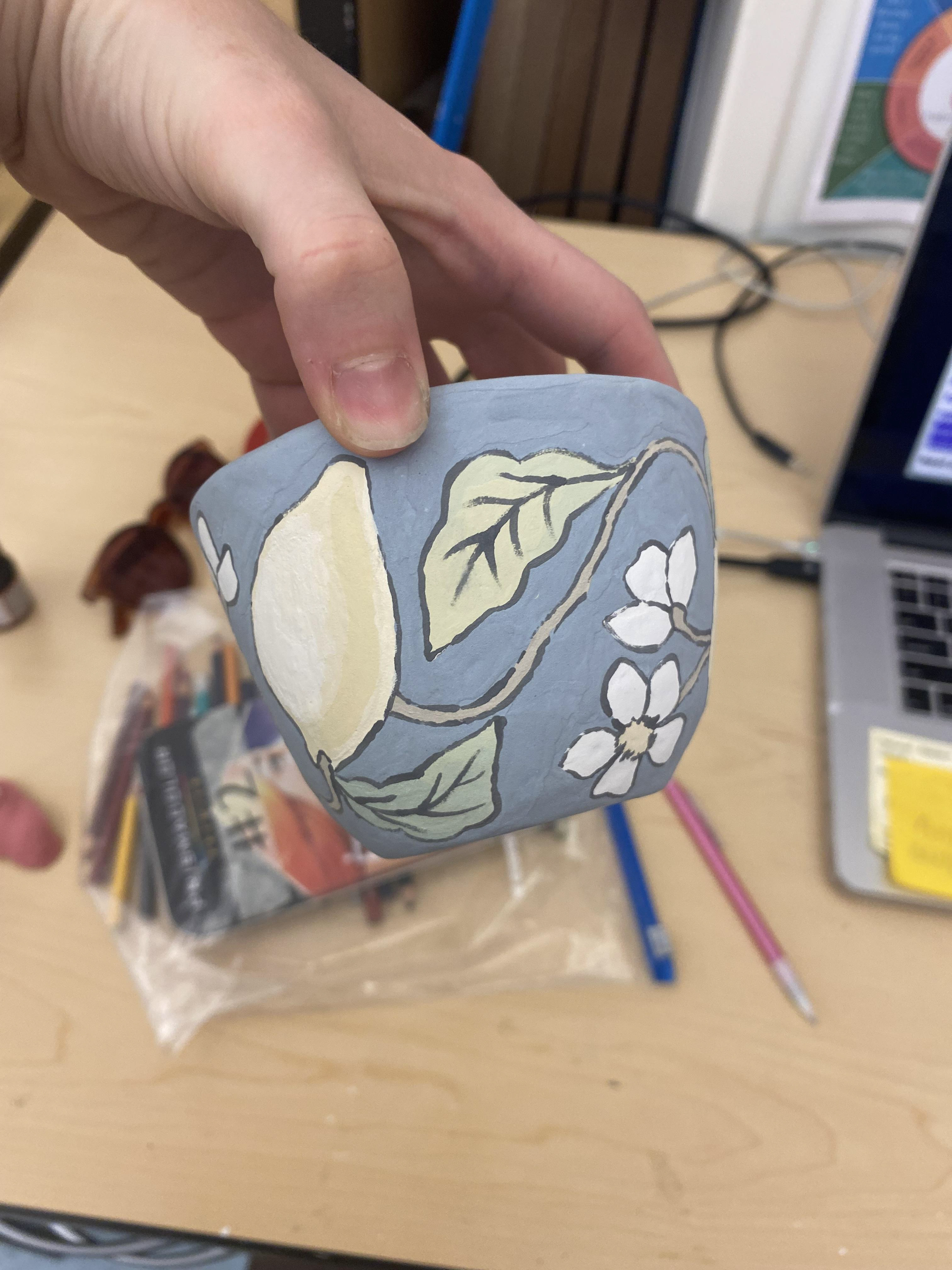 Addition of black lines to crisp up illustration, and aid as buffer if glaze colors bleed.