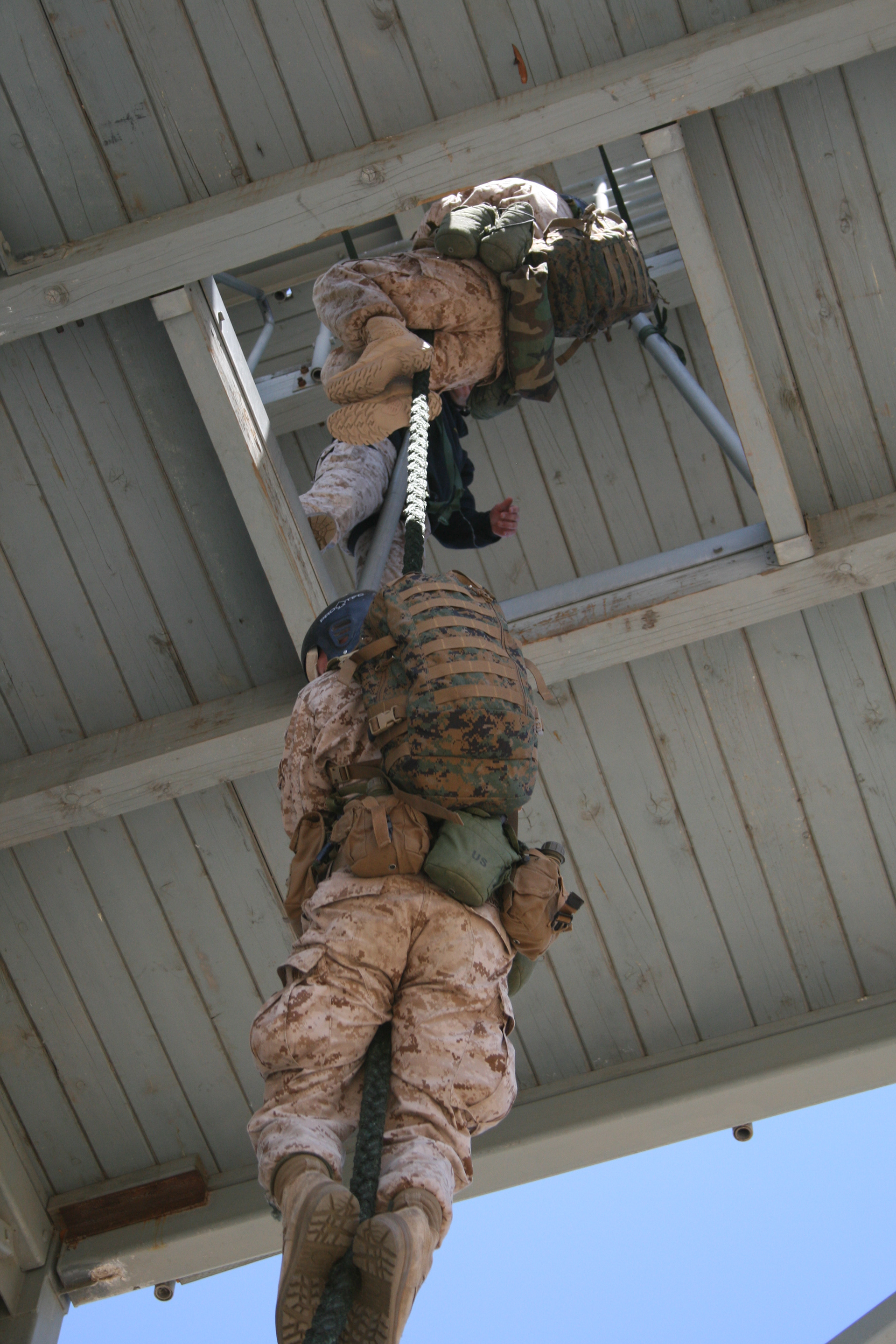 Soldiers had to train on the Fast Rope with backpacks and equipment that weighed 70 lbs and up. They had to be able to control their descent with their gloves as well as their boots.