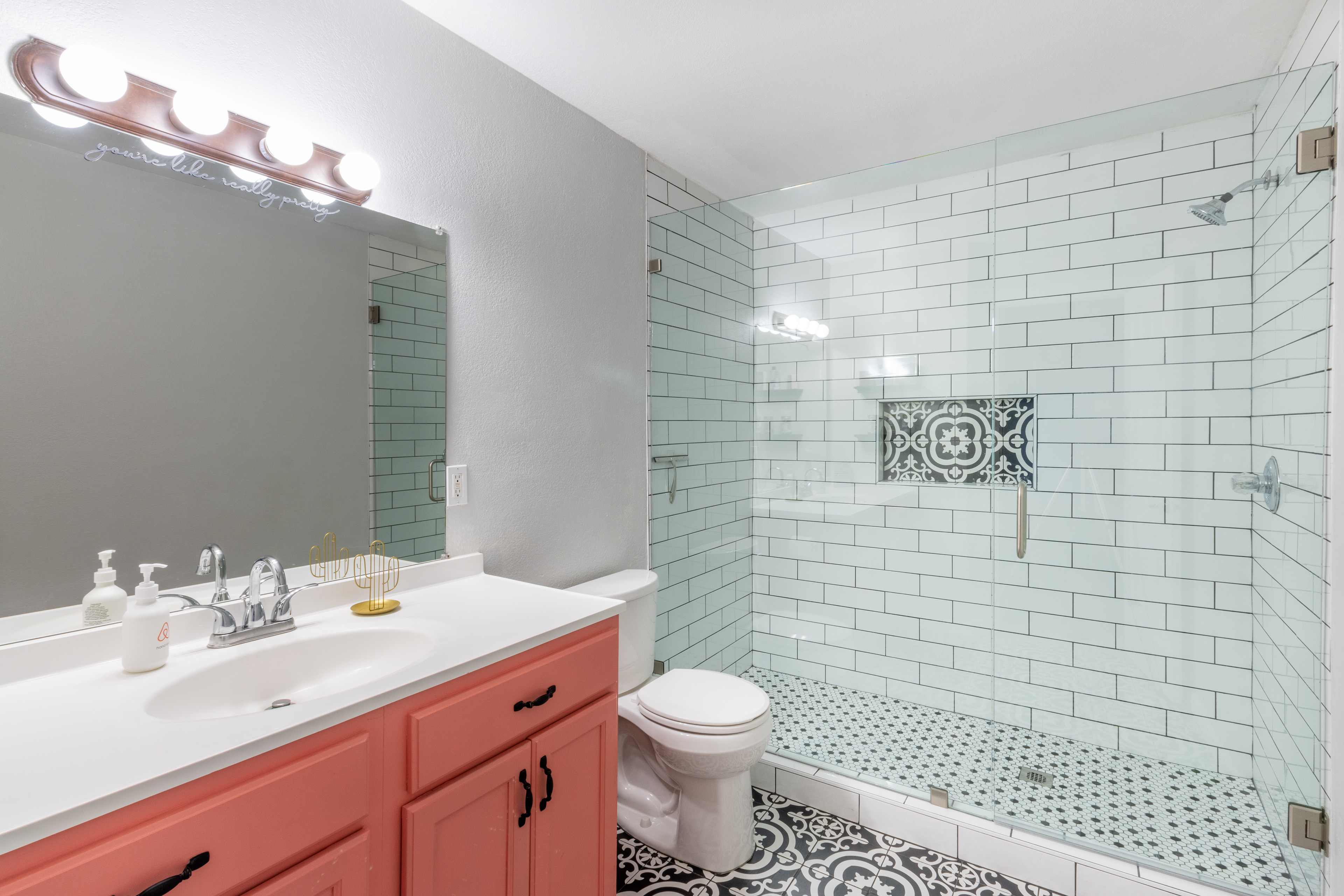 Bathroom with subway tile shower