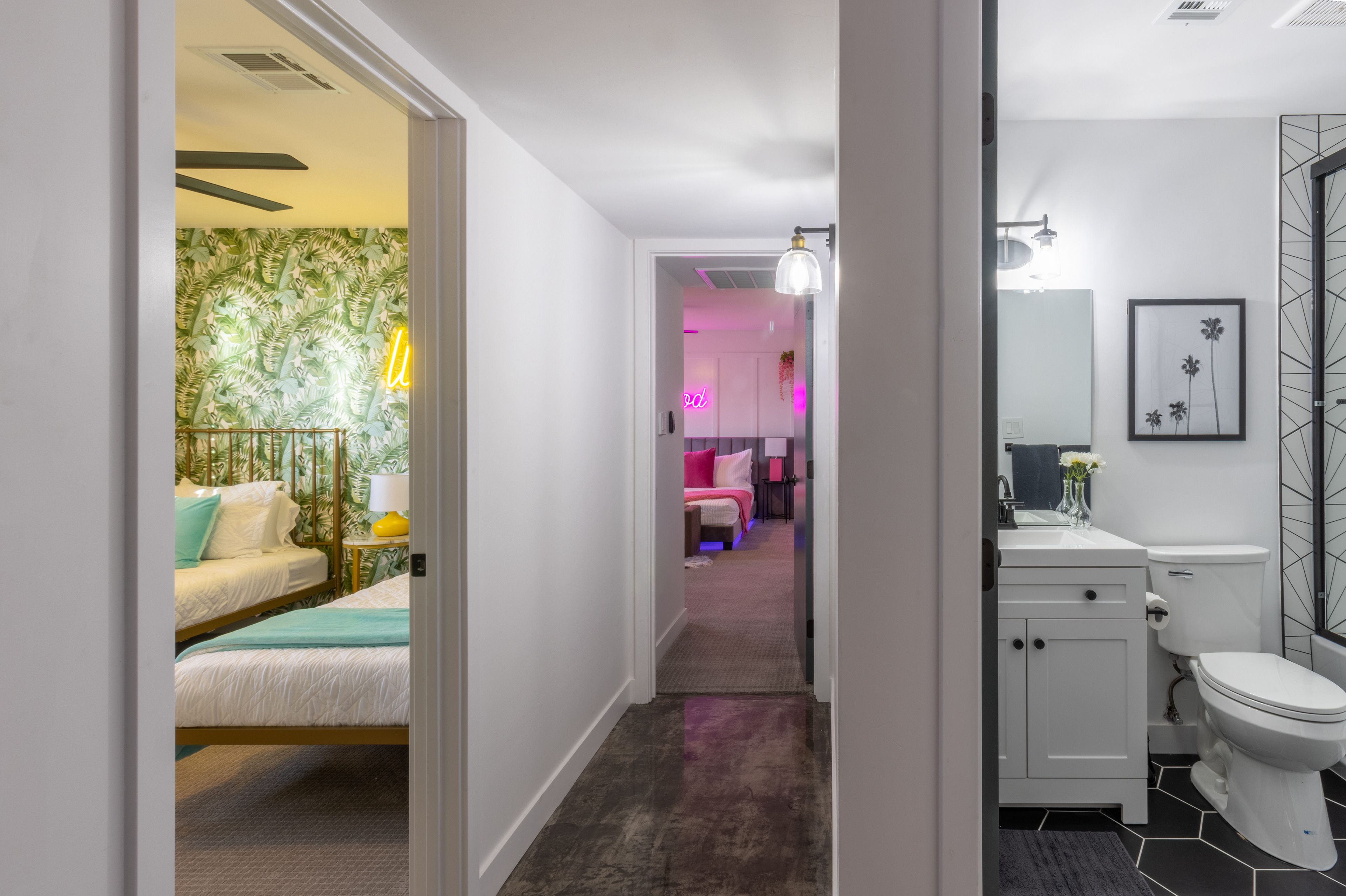 Hallway view into a pink bedroom