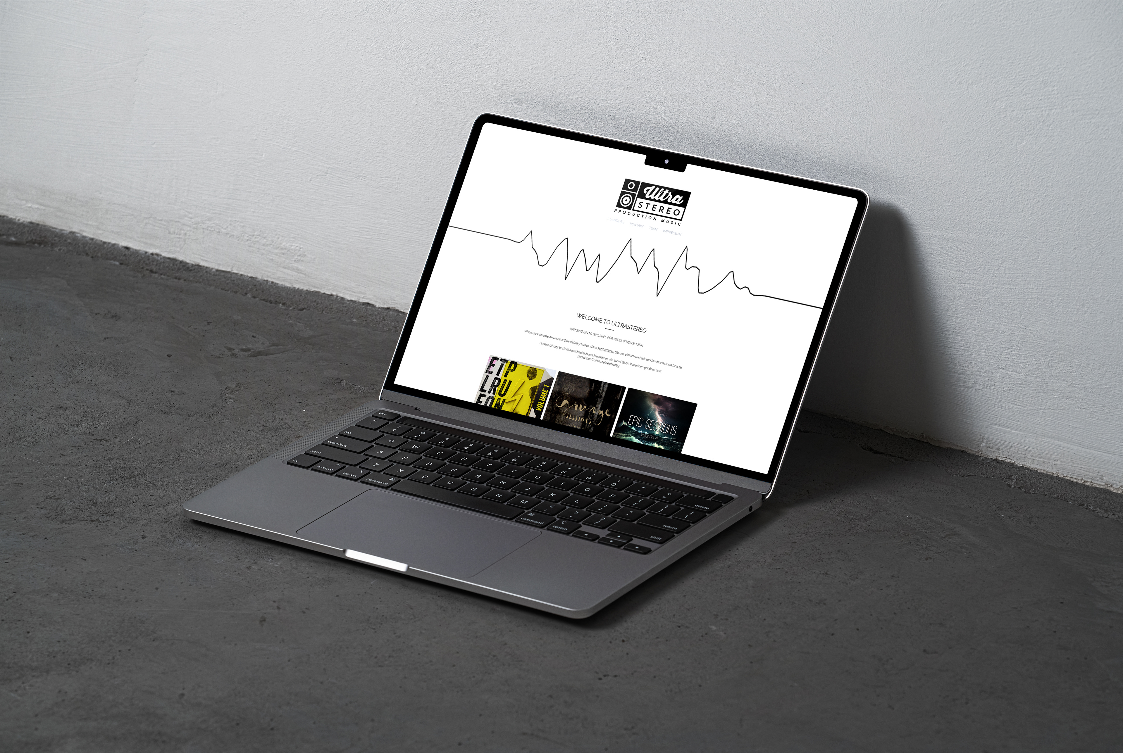 a laptop displays the company's website