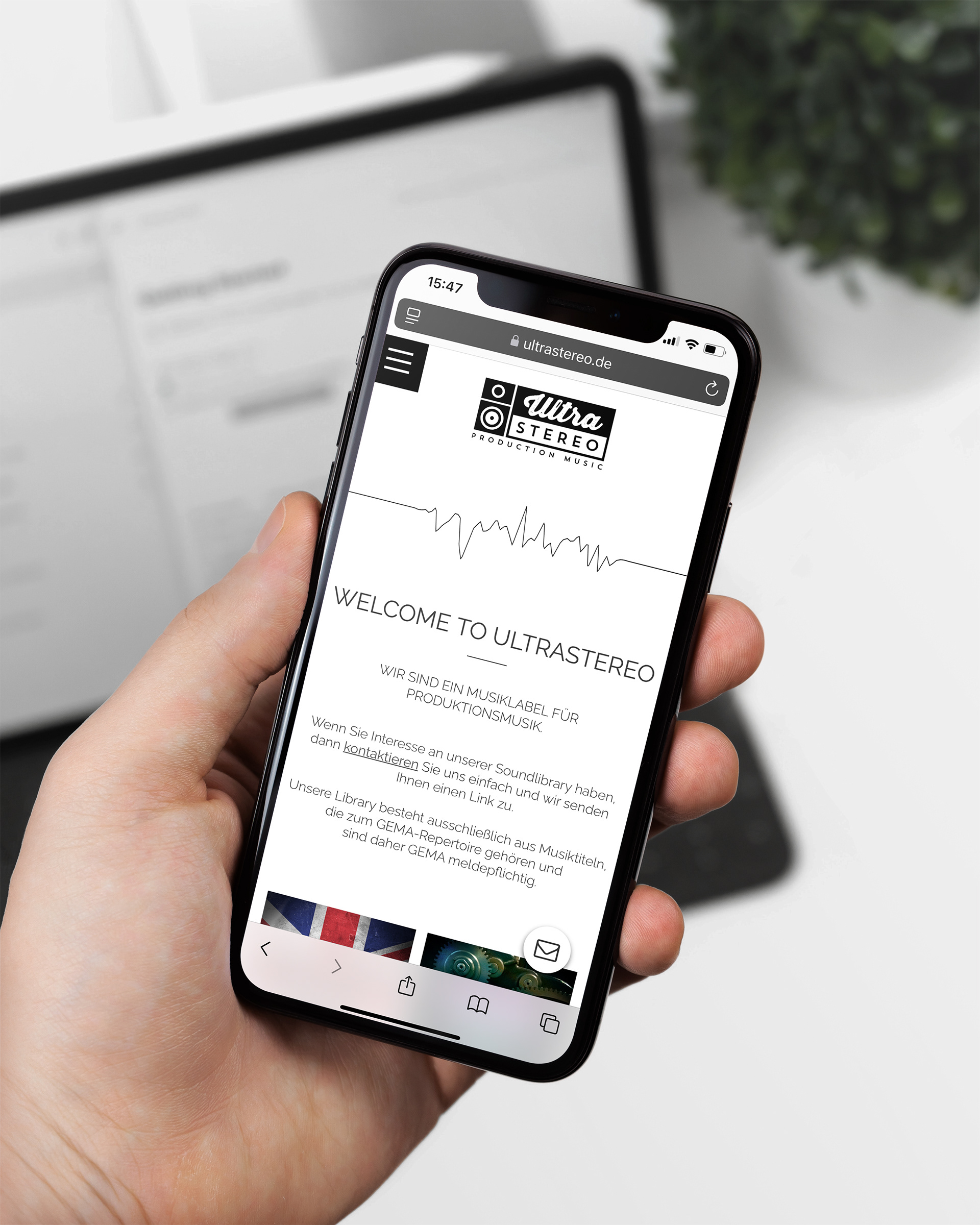 a smartphone displays the company's website