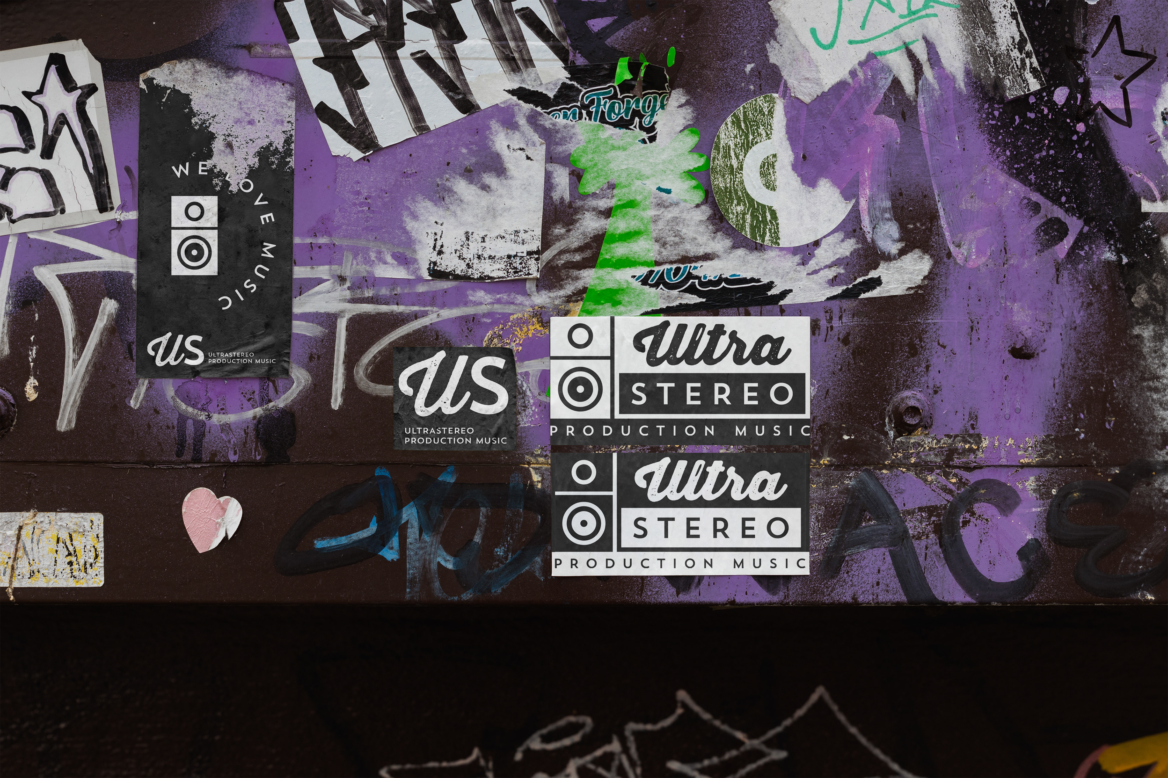 a few stickers on the wall with the logo of Ultrastereo