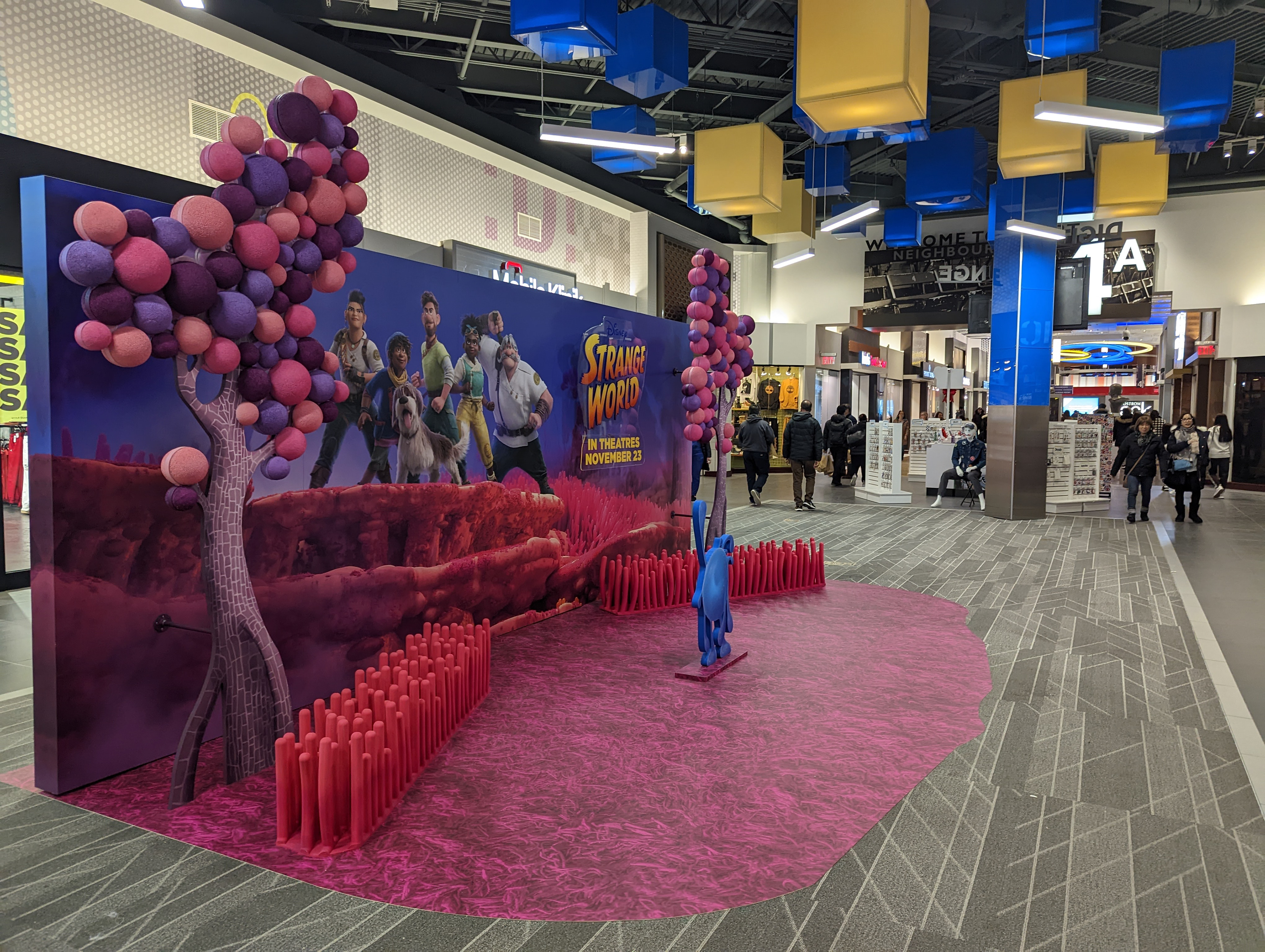 Custom Built Millwork Walls, Custom Flooring, Custom Standee, Custom Acrylic Title Treatment Sign, Foam Carved Spheres for Trees + Custom Carved Coral