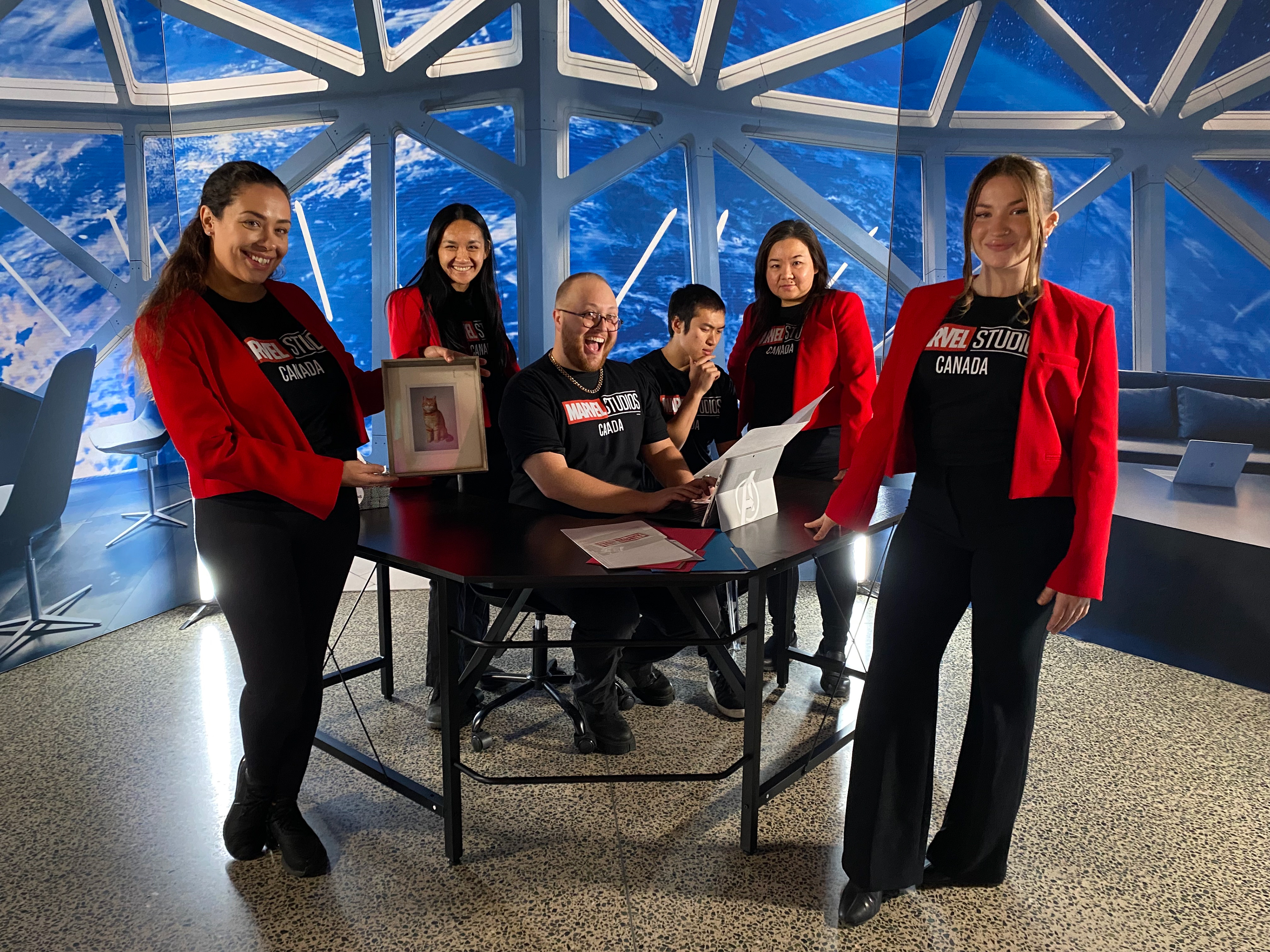 Custom Backwall with Props + Branded T-Shirts