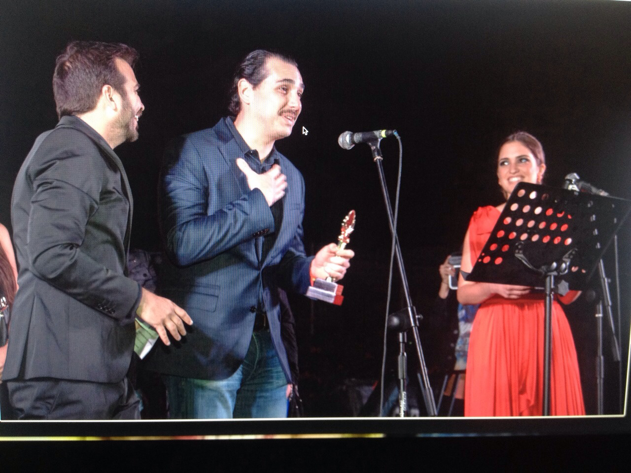 Receiving "Best Director" award for "La Monedita" short film.