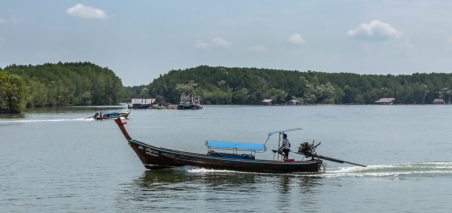 Longtail boat on the river