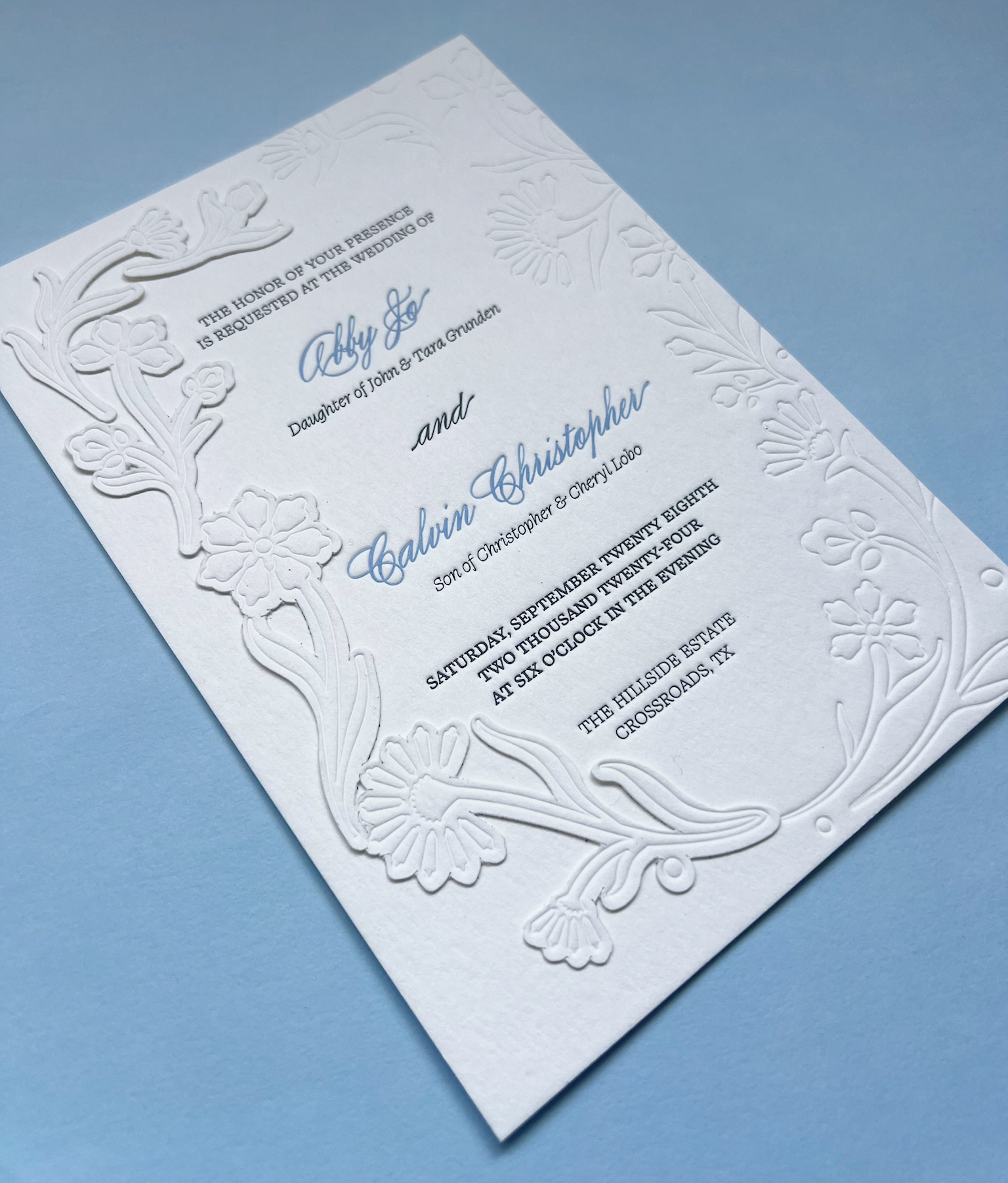 The main card had a deboss on flowers and text to mimic letterpress and more flowers pasted on to complete a crest