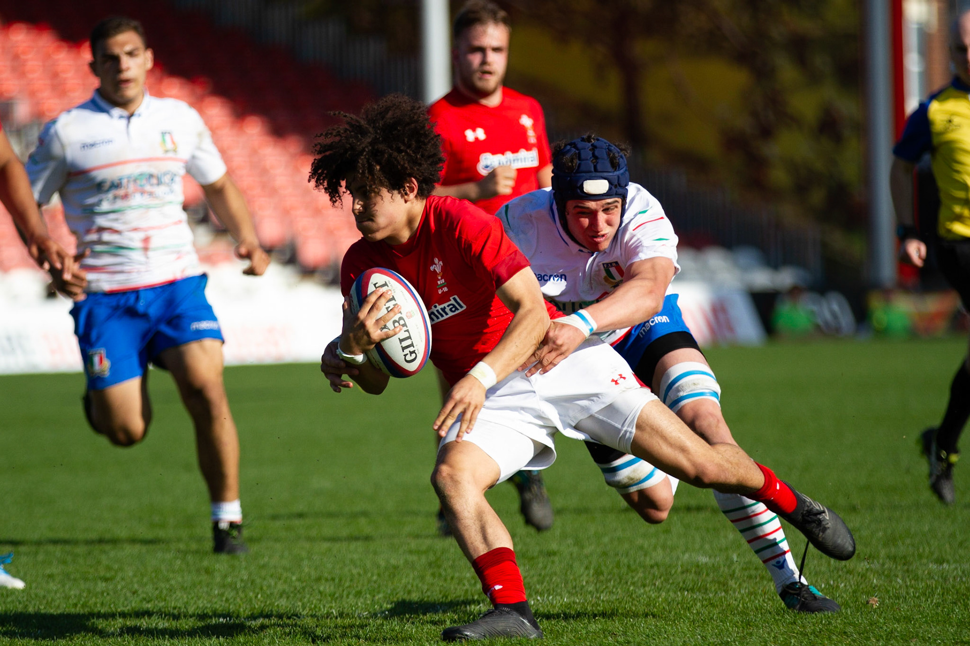 Wales half back breaks Italian tackle at 6Nations U18 rugby April 2019