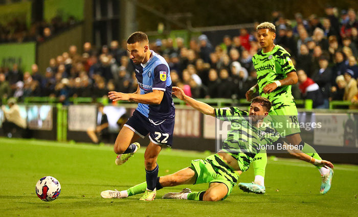 Nick Freeman of Wycombe Wanderers is tackled by Corey O'Keeffe of Forest Green Rovers during the Sky Bet League 1 match at the New Lawn, NailsworthPicture by John Barben/Focus Images Ltd 07973 42002212/11/2022