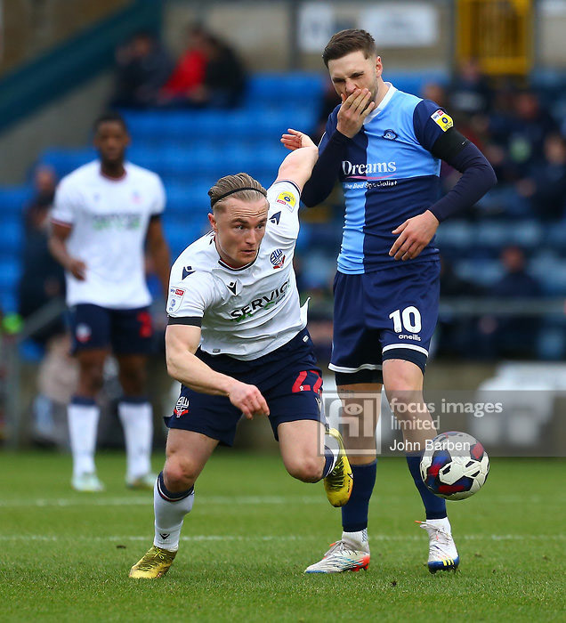Lewis Wing of Wycombe Wanderers holds his mouth after being struck by Kyle Dempsey of Bolton Wanderers during the Sky Bet League 1 match at Adams Park, High WycombePicture by John Barben/Focus Images Ltd 07973 42002218/02/2023