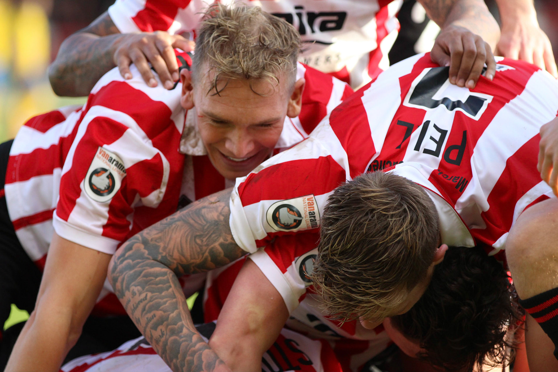 Danny Wirght and Harry Pell of Cheltenham Town celebrating a goal