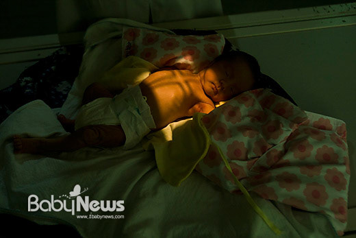 A baby abandoned is undergoing an X-ray health checkup at a local public hospital in South Korea, 2014.