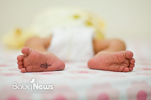 On the sole of the abandoned baby's feet, a number is written instead of ther baby's name. In South Korea 2014.