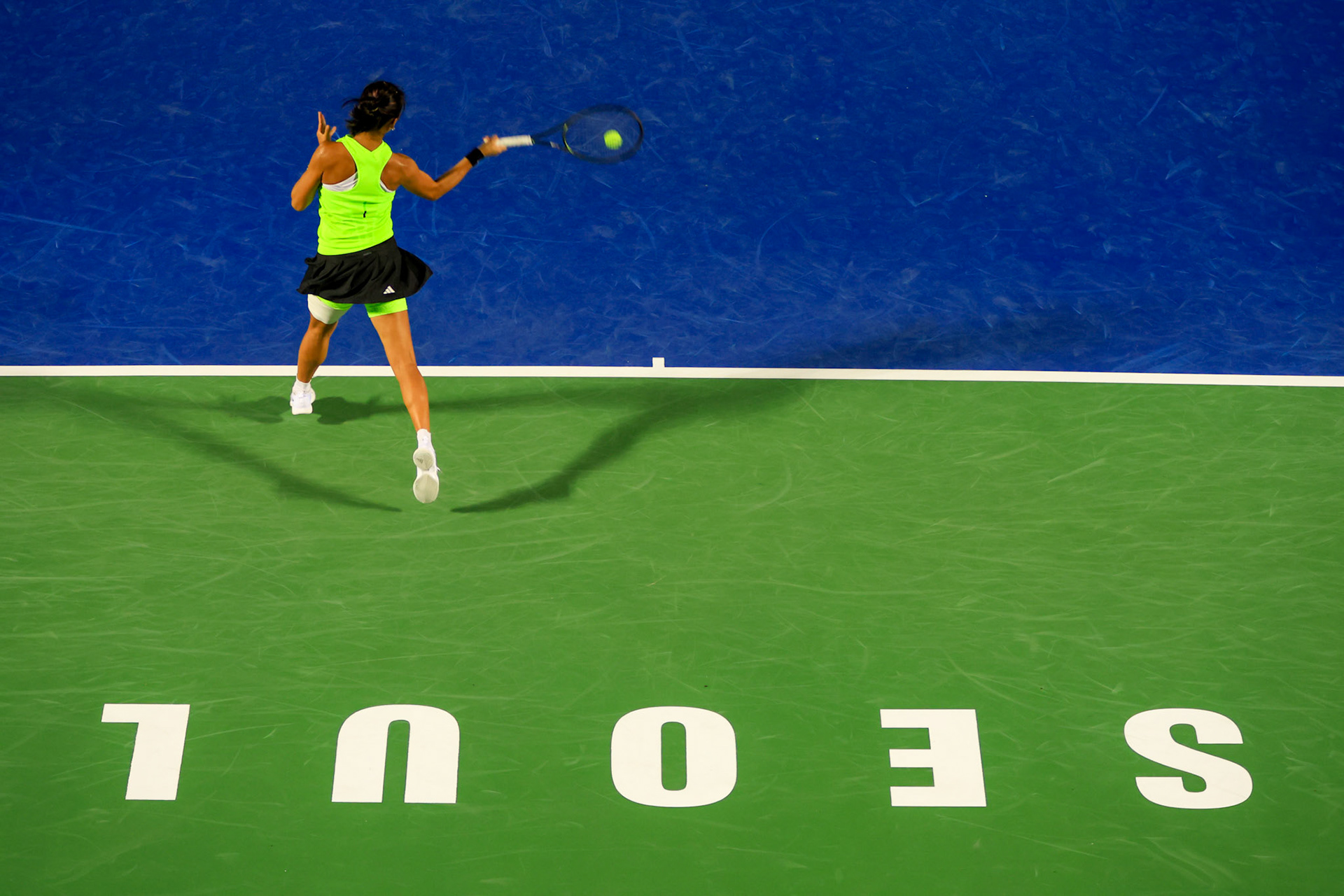 Yue Yuan of China in action against Marie Bouzkova of Czech Republic their round of singles quarterfinal match at the Hana Bank Korea Open Tennis Tournament at the Olympic Park Tennis Court in Seoul, South Korea, on October 13, 2023. Matrix Images / Lee Kitae