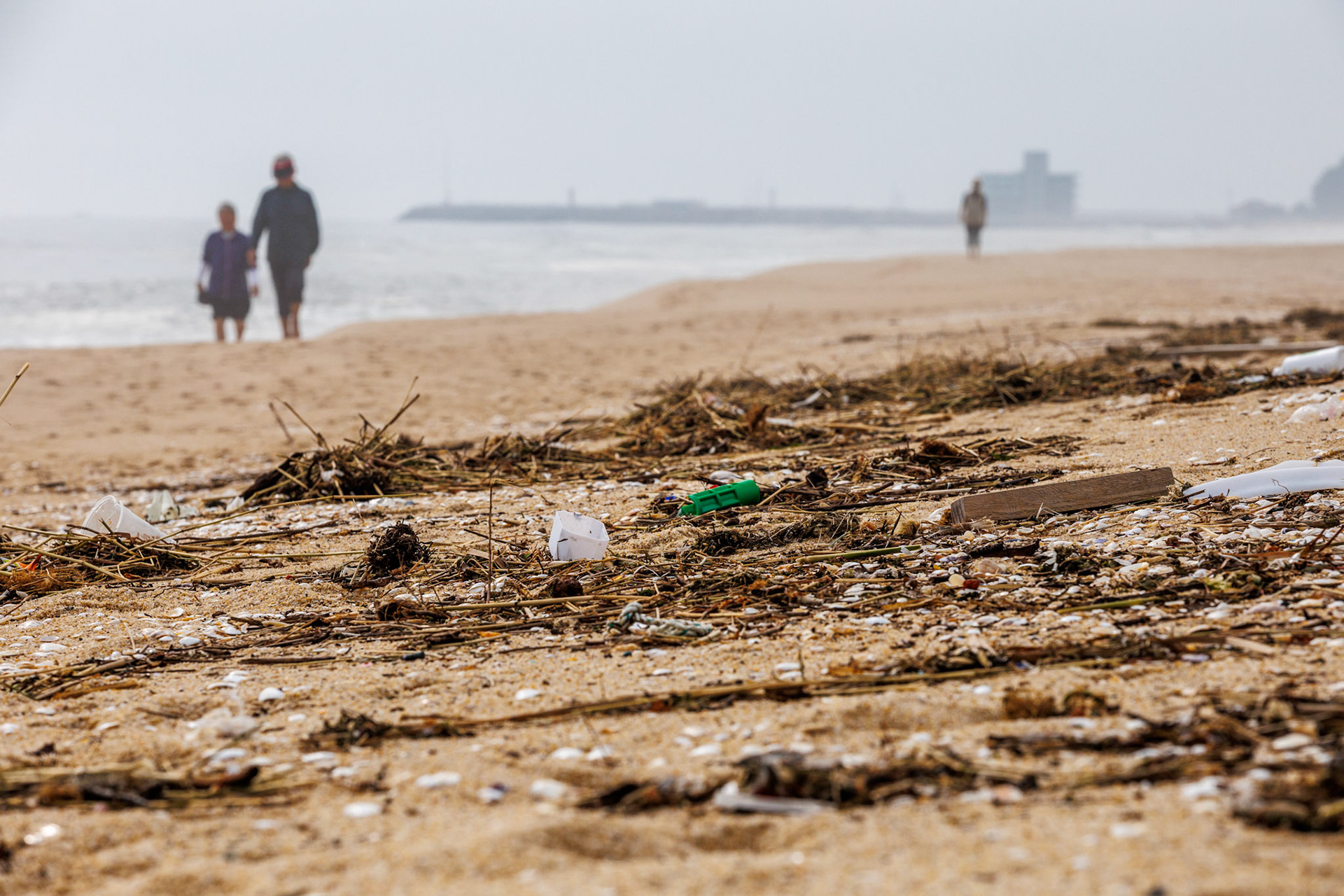 Travelers walk along the beach at Songjeong Beach in Gangneung City, Gangwon Province, South Korea, August 12, 2023. Tropical Typhoon Kanun caused heavy rain and strong winds in most parts of the country from the 9th to the 11th. In Gangwon-do, a very strong wind blew with a maximum instantaneous wind speed of more than 80 km/h. The wave height in Gangwon-do is currently 1.5m to 4m. Matrix Images/Lee Kitae