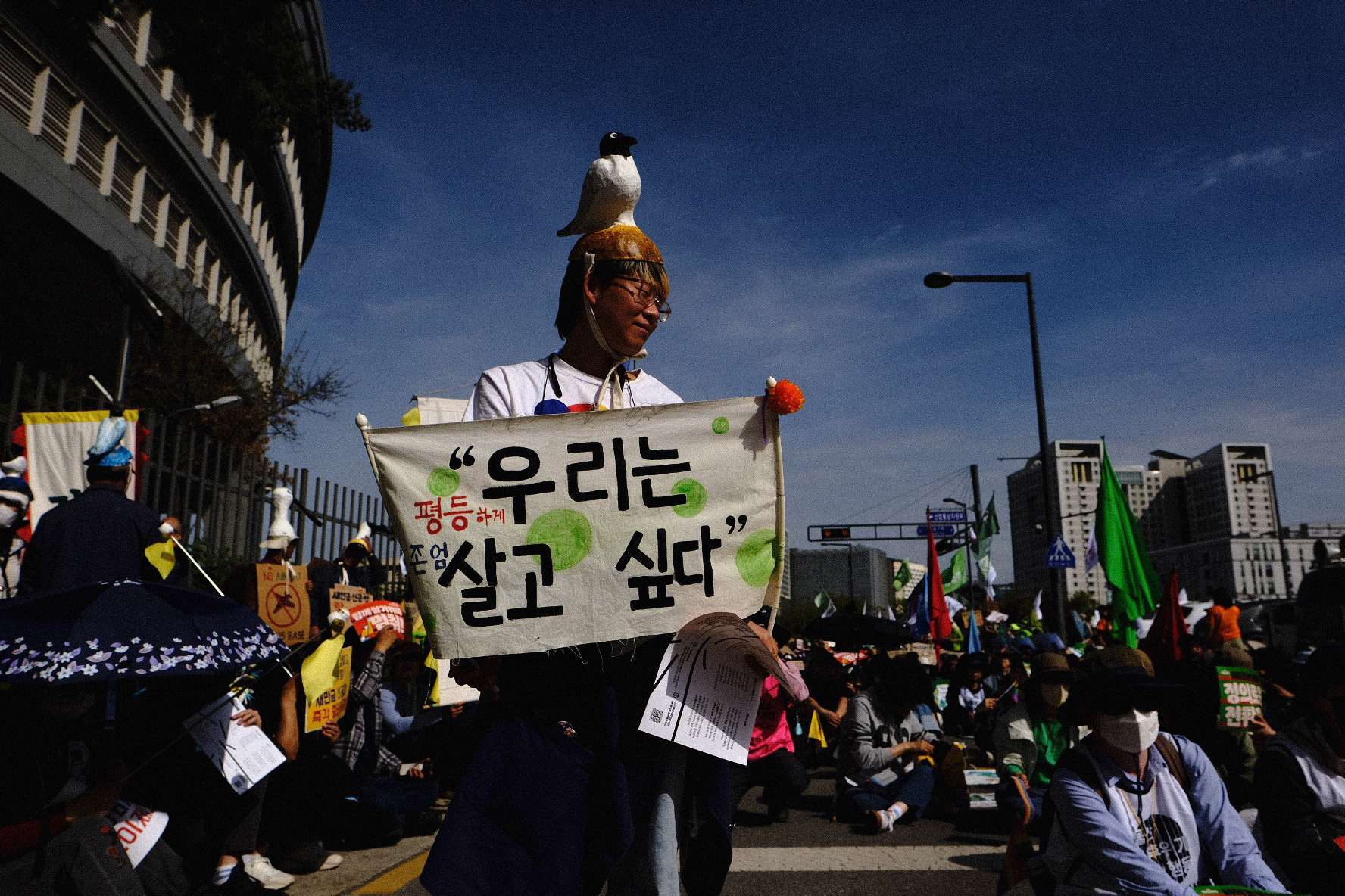 414 Climate Justice protesters march in front of the Sejong Government Complex in Sejong, Republic of Korea, April 14, 2023. Matrix Images/Lee Kitae