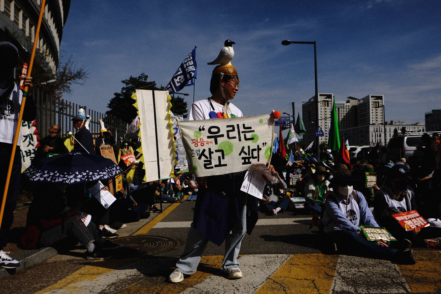 414 Climate Justice protesters march in front of the Sejong Government Complex in Sejong, Republic of Korea, April 14, 2023. Matrix Images/Lee Kitae