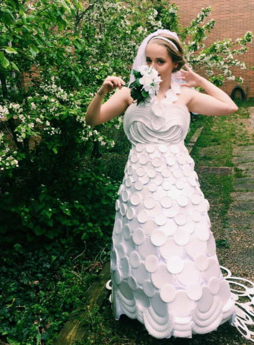 Dress made entirely of muslin and styrofoam cups, plates and bowls for an independent study for innovative fashion. 