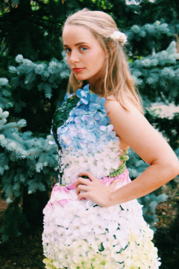 Dress made entirely of faux flowers and wire as part of an independent study for innovative fashion 