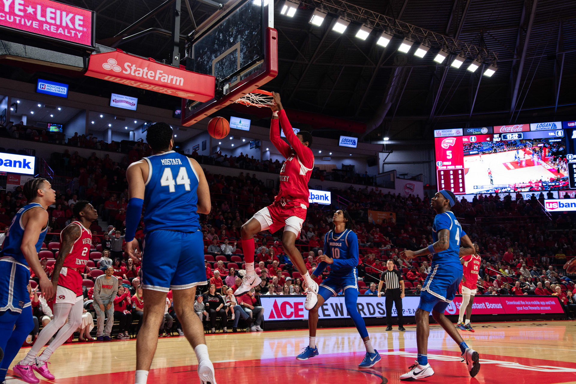 Leeroy Odiahi makes a slam-dunk during the 1st half of the Middle Tennessee vs. WKU men's basketball game on Feb. 15, 2025, in Diddle Arena.