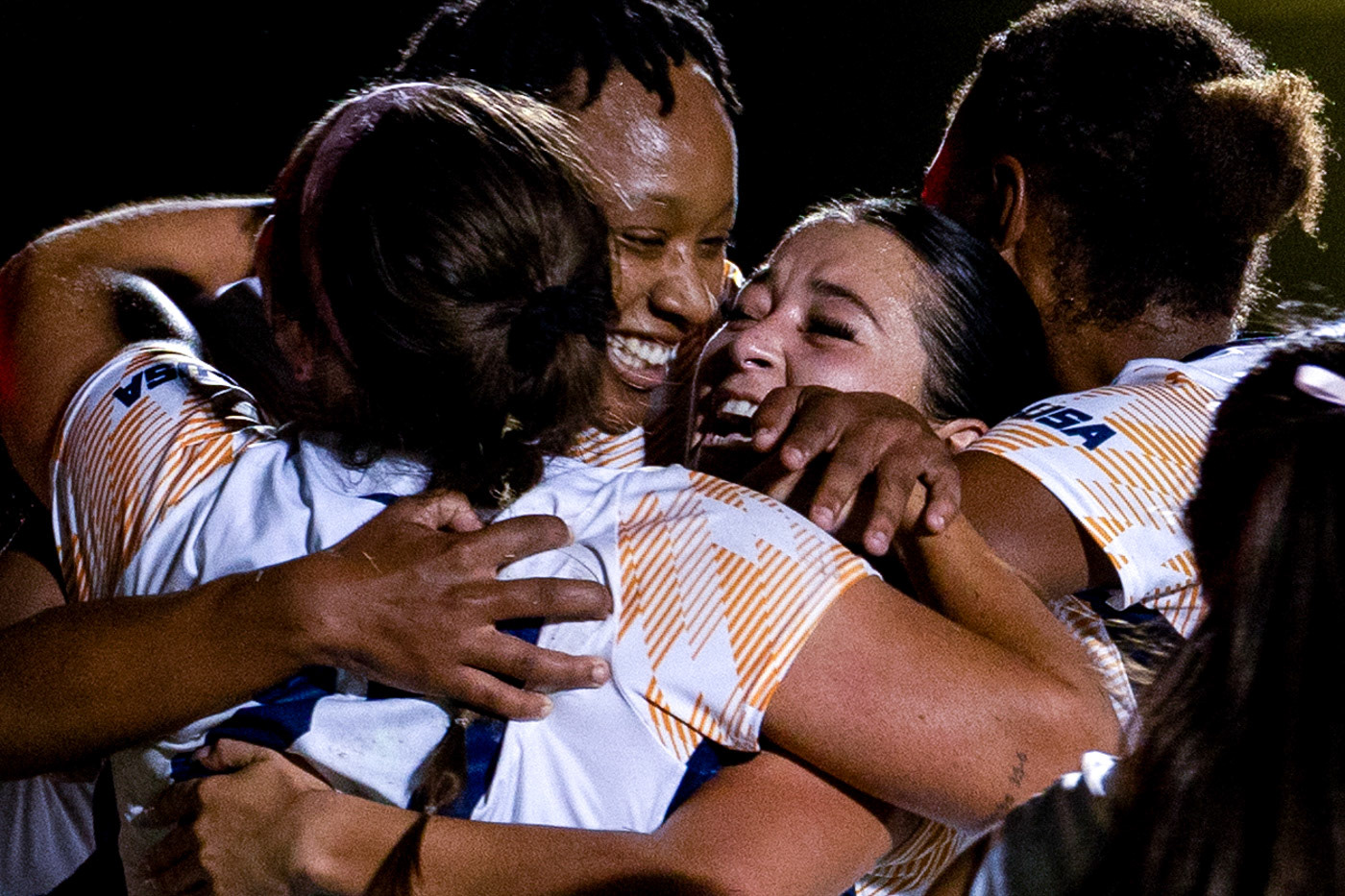 University of Texas at El Paso midfielder Zeta McDannels (27) is embraced by her team after scoring her first career goal on Thursday, Oct. 16, 2025 during a game against the University of Texas at El Paso at Western Kentucky’s soccer complex in Bowling Green, Ky.