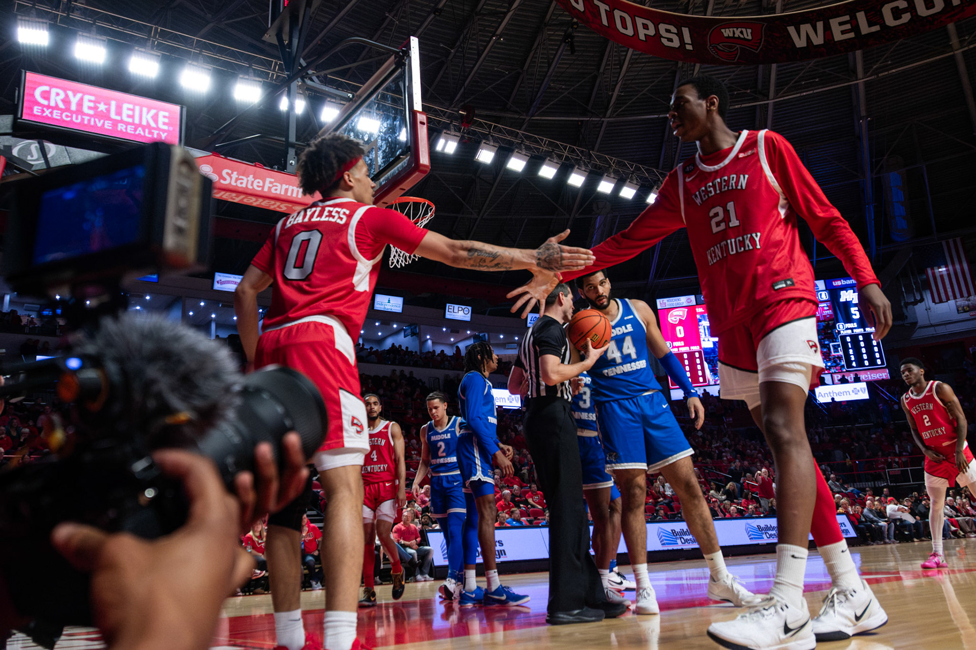 Braxton Bayless and Leeroy Odiahi (left to right) clap hands after a play during the Middle Tennessee vs. WKU men's basketball game on Feb. 15, 2025, in Diddle Arena.