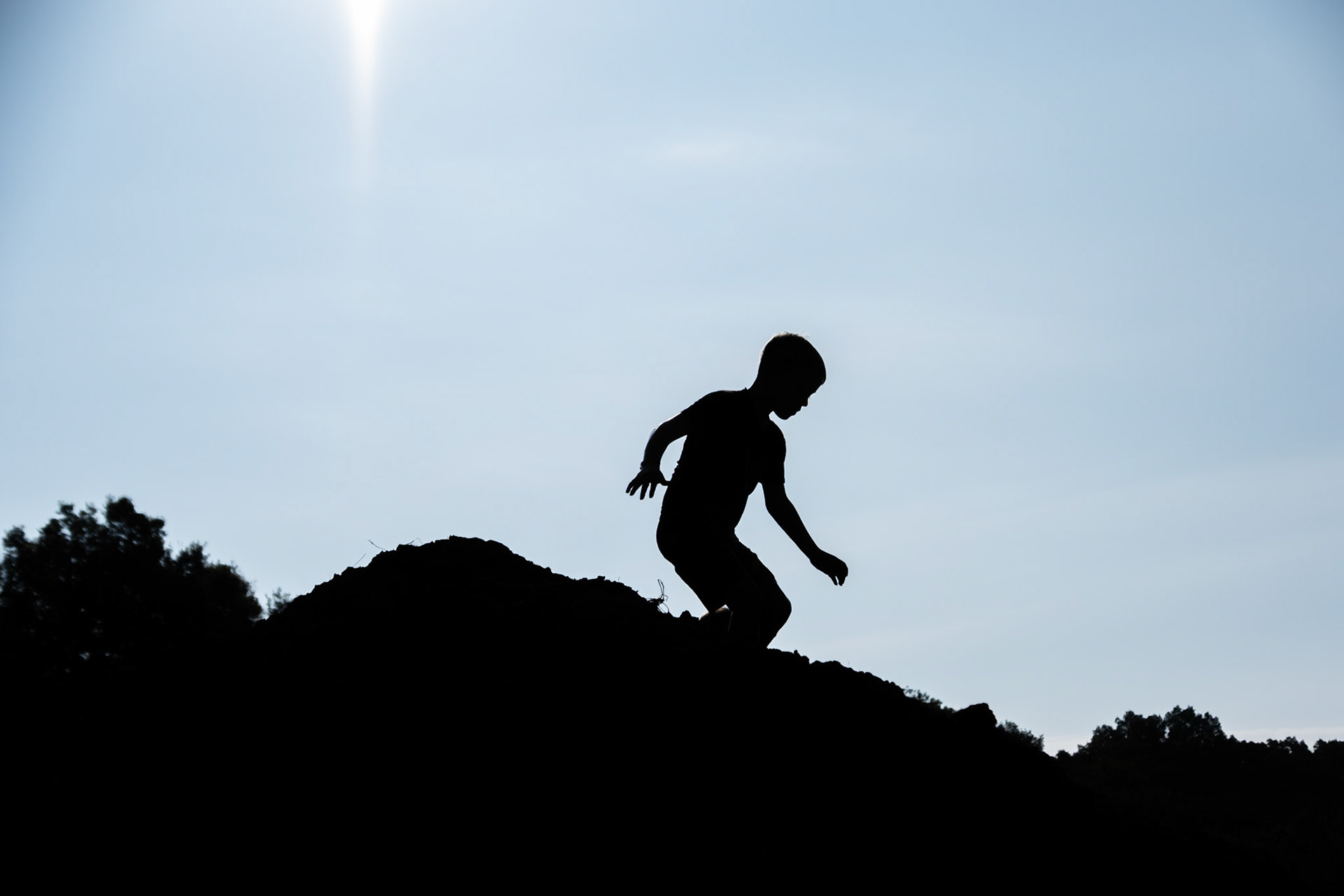 A child runs the miniature mud obstacle course during the 13th annual Bowling Green Mud Run on Aug. 23, at Phil Moore park. The purpose of the fundraiser was to raise money for services that work to end child abuse and improve local family courts.