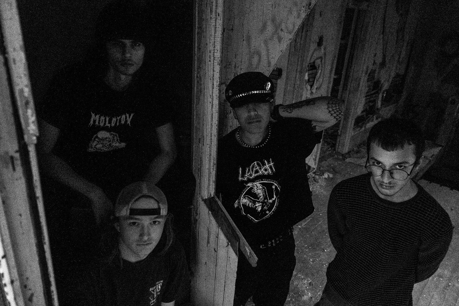 Braxton Brown poses around an abandoned building with his fellow "Farynx" band members on April 10.