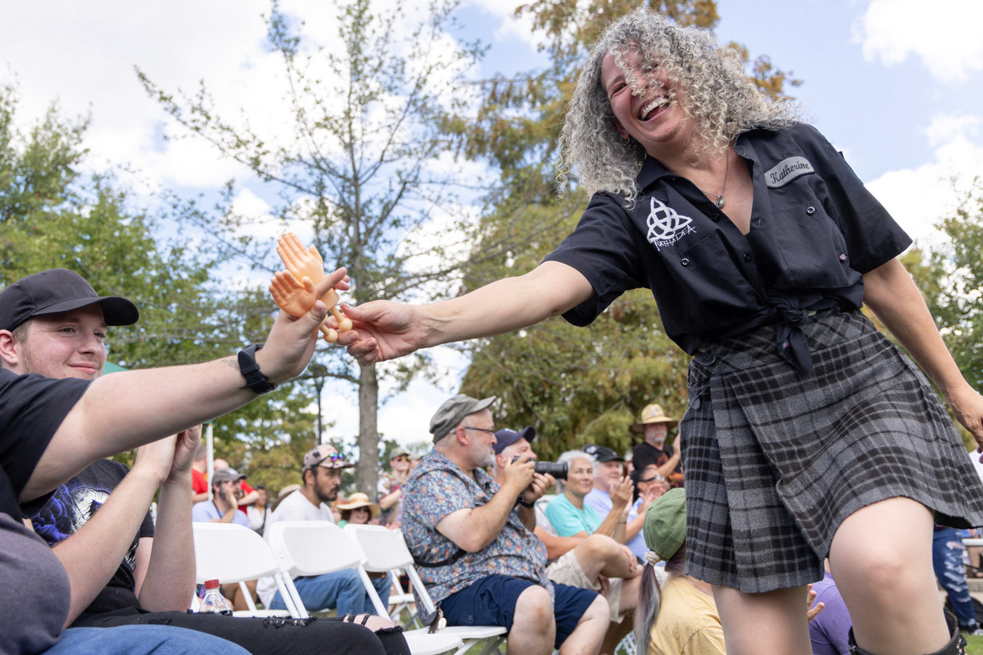 Appalachian Irish rock band “Tuatha Dea’s” Katherine Bush  interacts with the crowd during the Bowling Green International Festival at Circus Square Park on Saturday, Sept. 27, 2025.