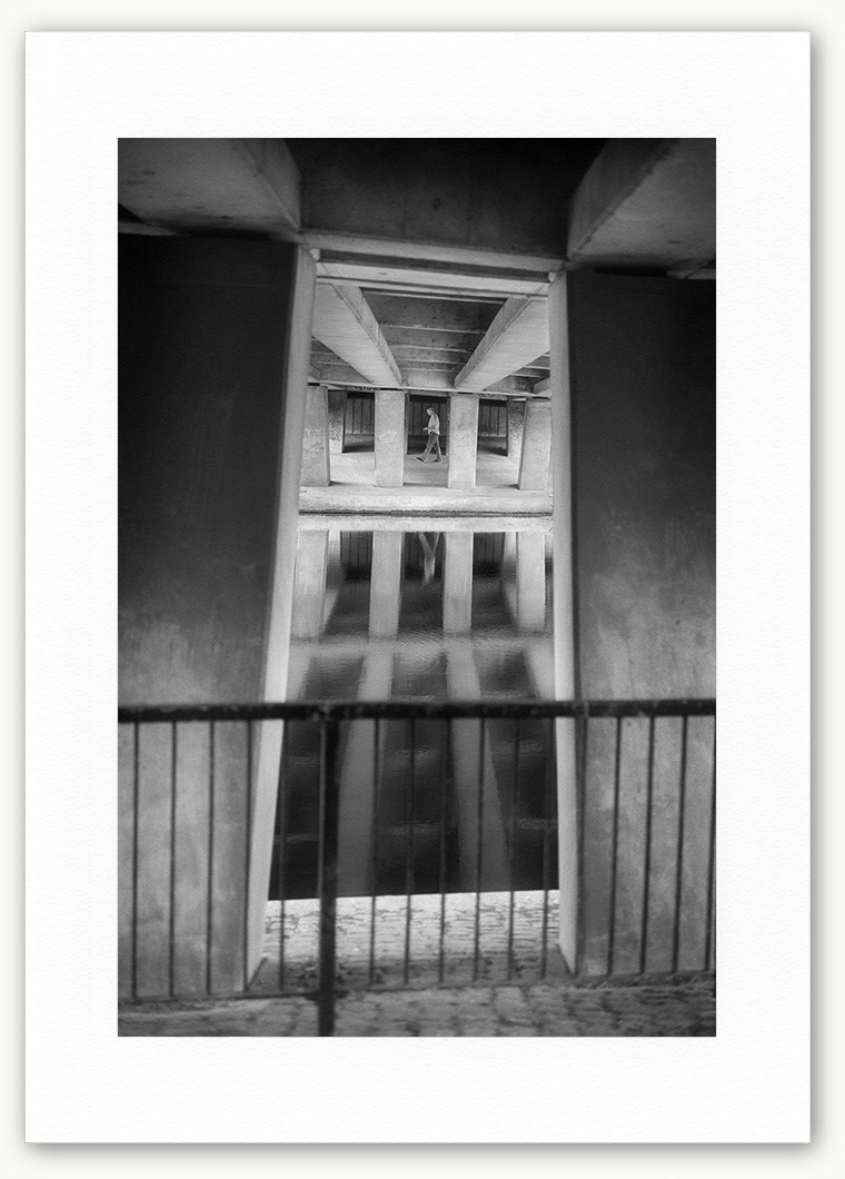 Steve Hanson Photography Man walking under a bridge,  Leicester, England.