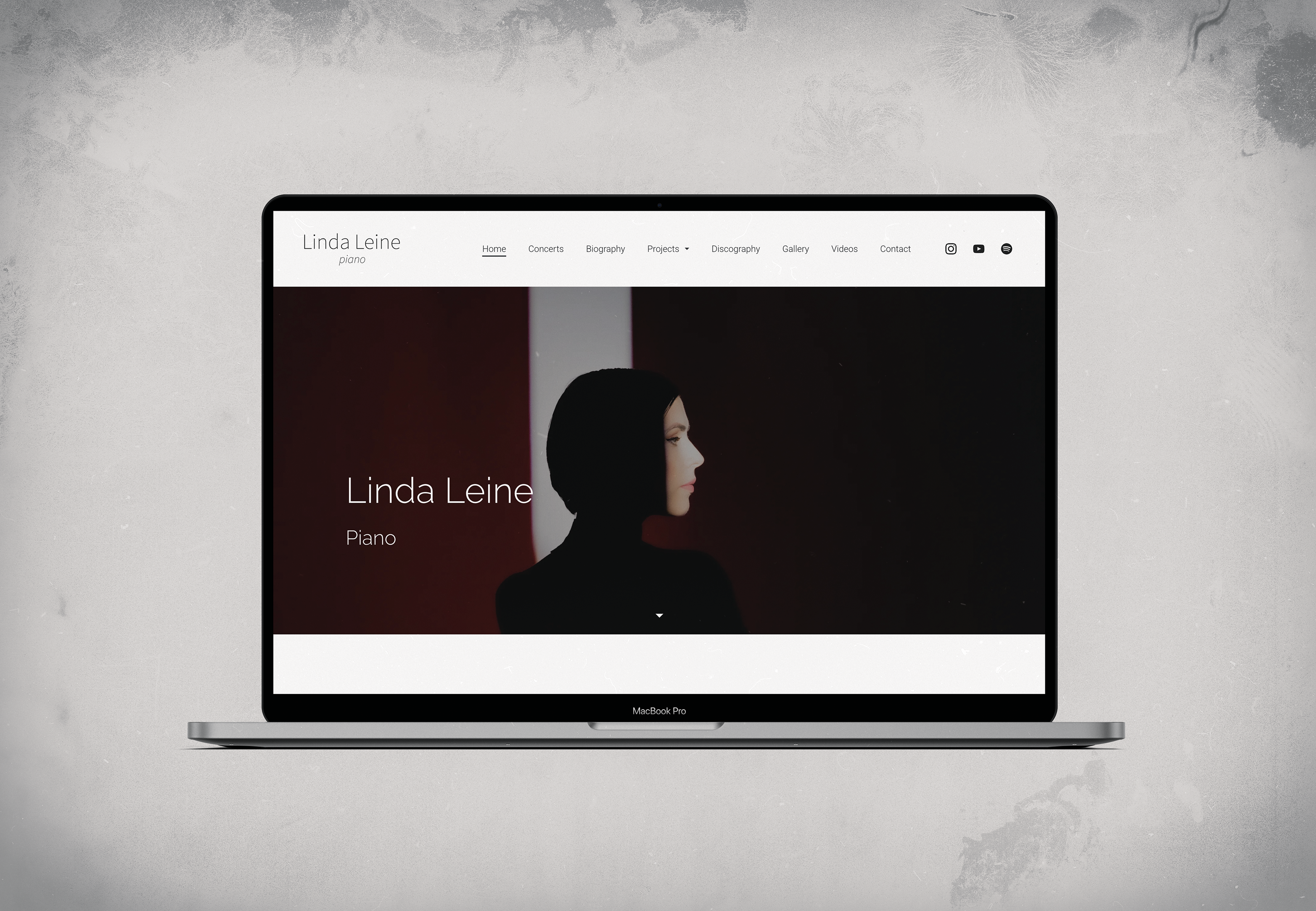 Homepage of lindaleine.com displayed on a laptop, featuring a minimalist red-toned portrait of pianist Linda Leine.