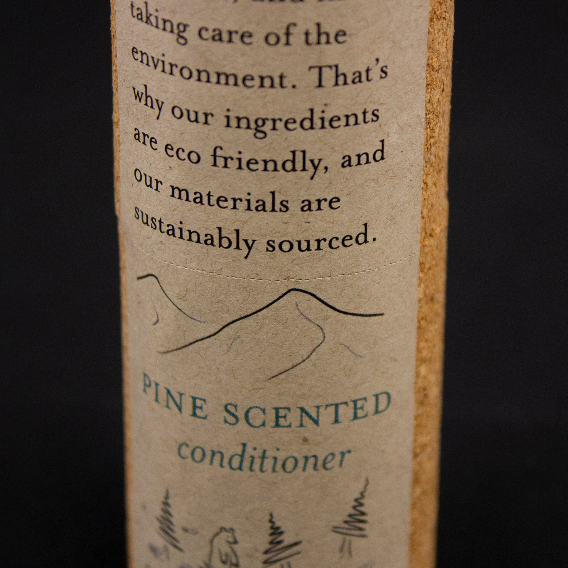 Closeup photo of the package sleeve, showing detail on the design and perforations on the label.
