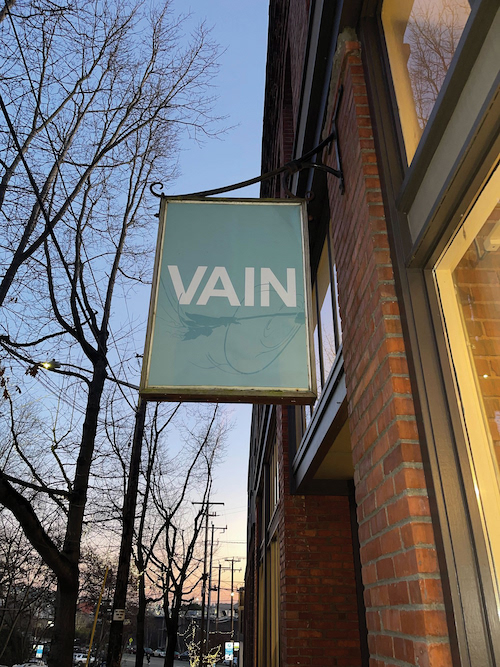 Vain's current storefront sign.