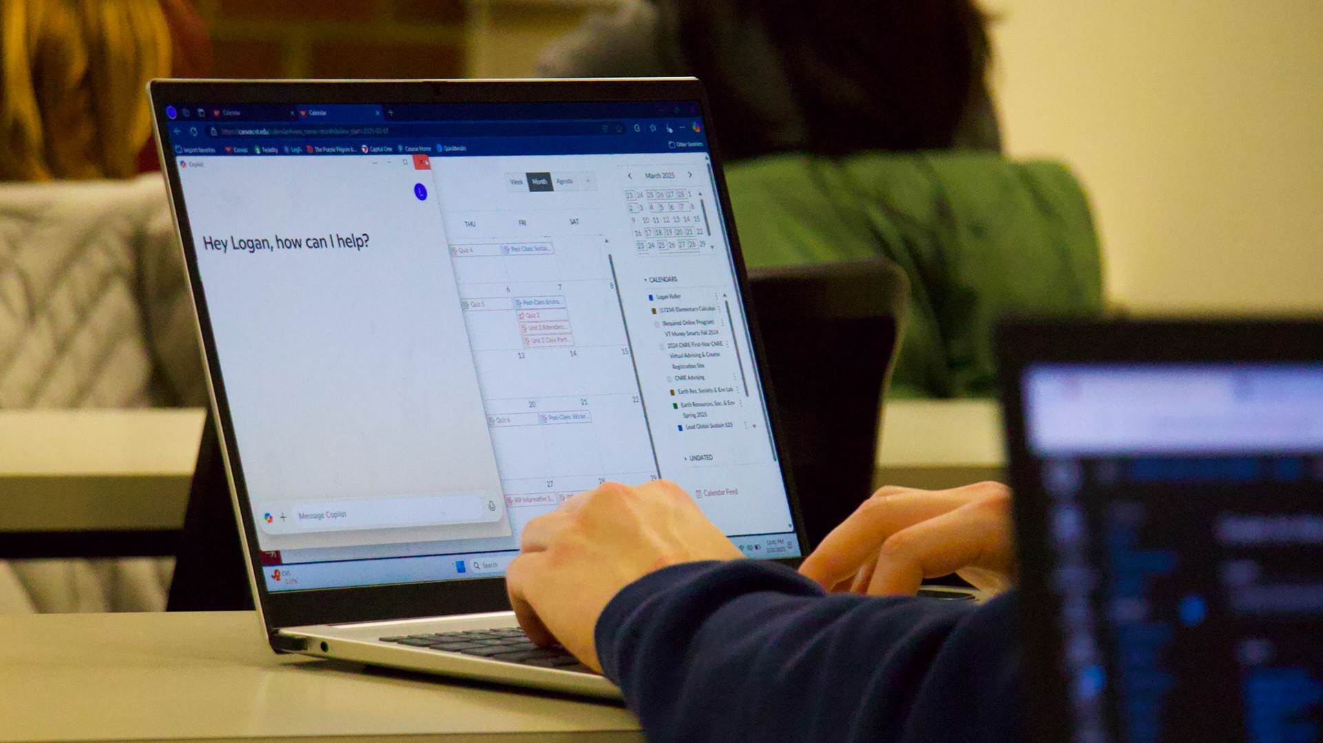 Blacksburg, Virginia, Feb. 21, 2025 --- Hey, Logan: A student in public speaking class opens up ChatGPT to ask the chatbot a question before he asks the instructor.