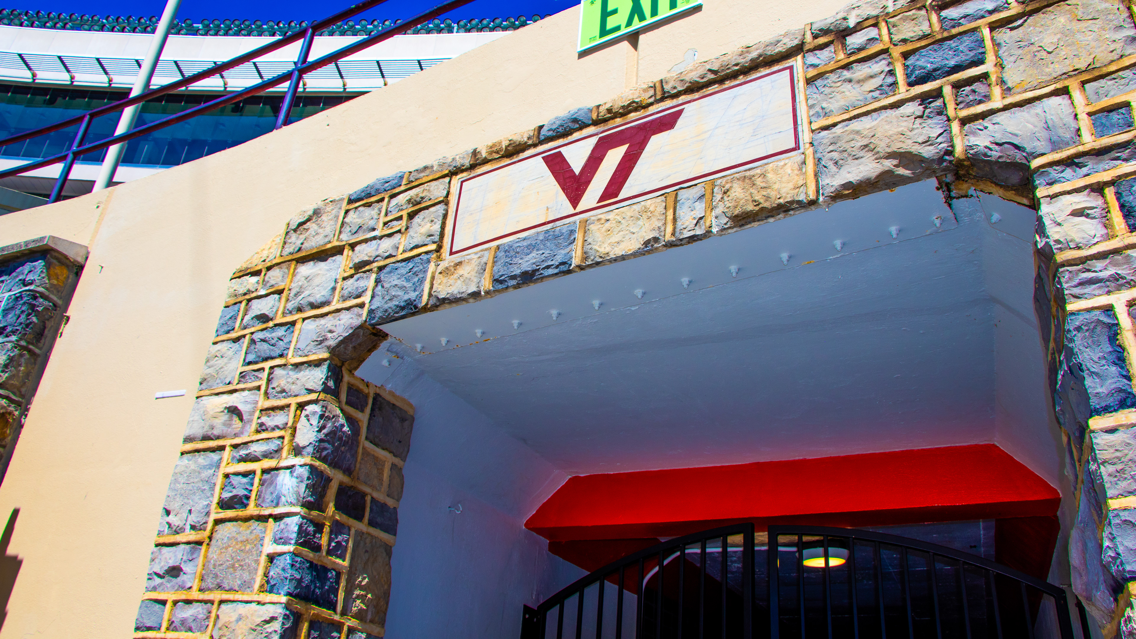 Blacksburg, Virginia, May 10, 2025 — Tradition in Motion: At the Lane Stadium tunnel, participants in the Run for Remembrance touch the Hokie Stone as they run through the stadium, mirroring a game-day ritual and symbolizing unity, resilience and Hokie spirit. Photo: Michaela Scott