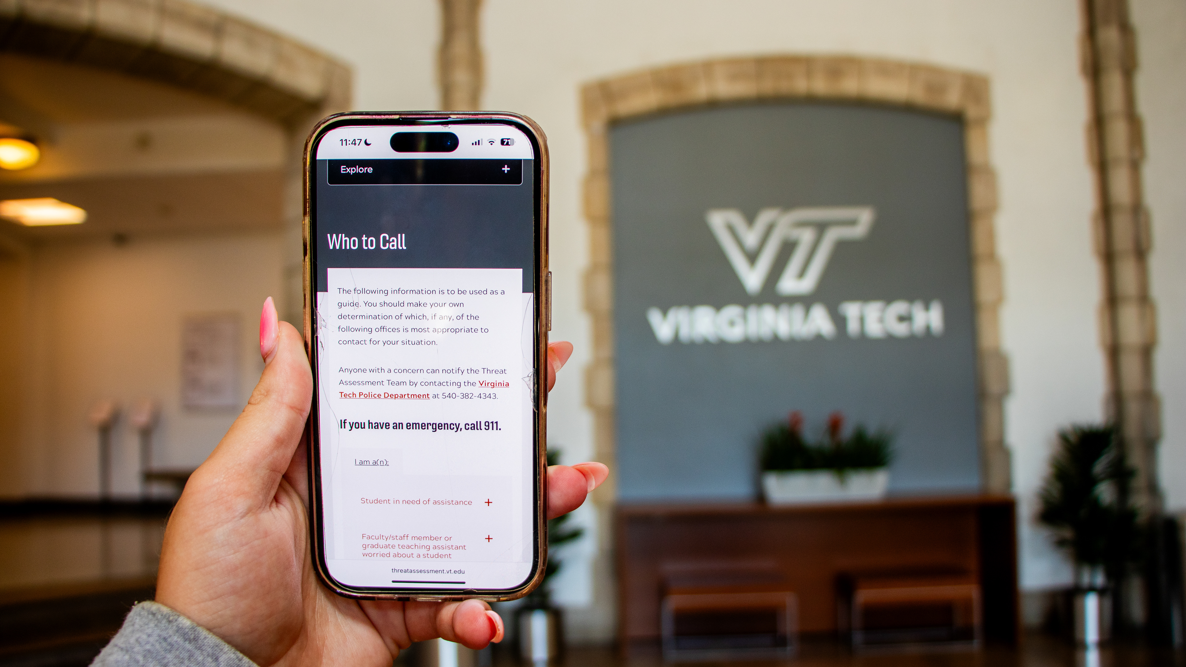 Blacksburg, Virginia, May 10, 2025 — In Safe Hands: A student accesses VT's Threat Assessment Team resources on their phone, representing that safety and support are always within reach. Photo: Michaela Scott