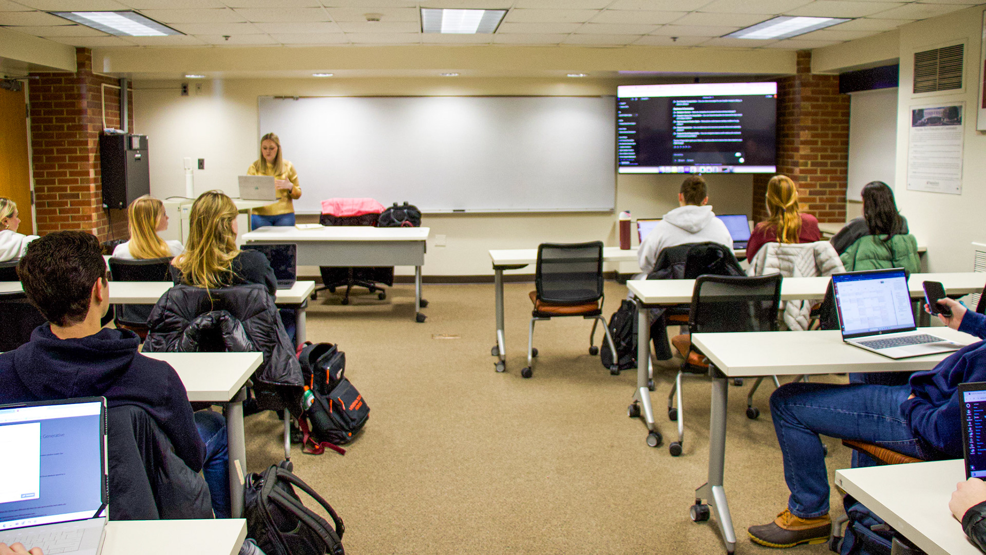 Blacksburg, Virginia, Feb. 21, 2025 --- AI-Driven Classrooms: Katie Thomas' public speaking class listens to the lesson about using generative AI to research.