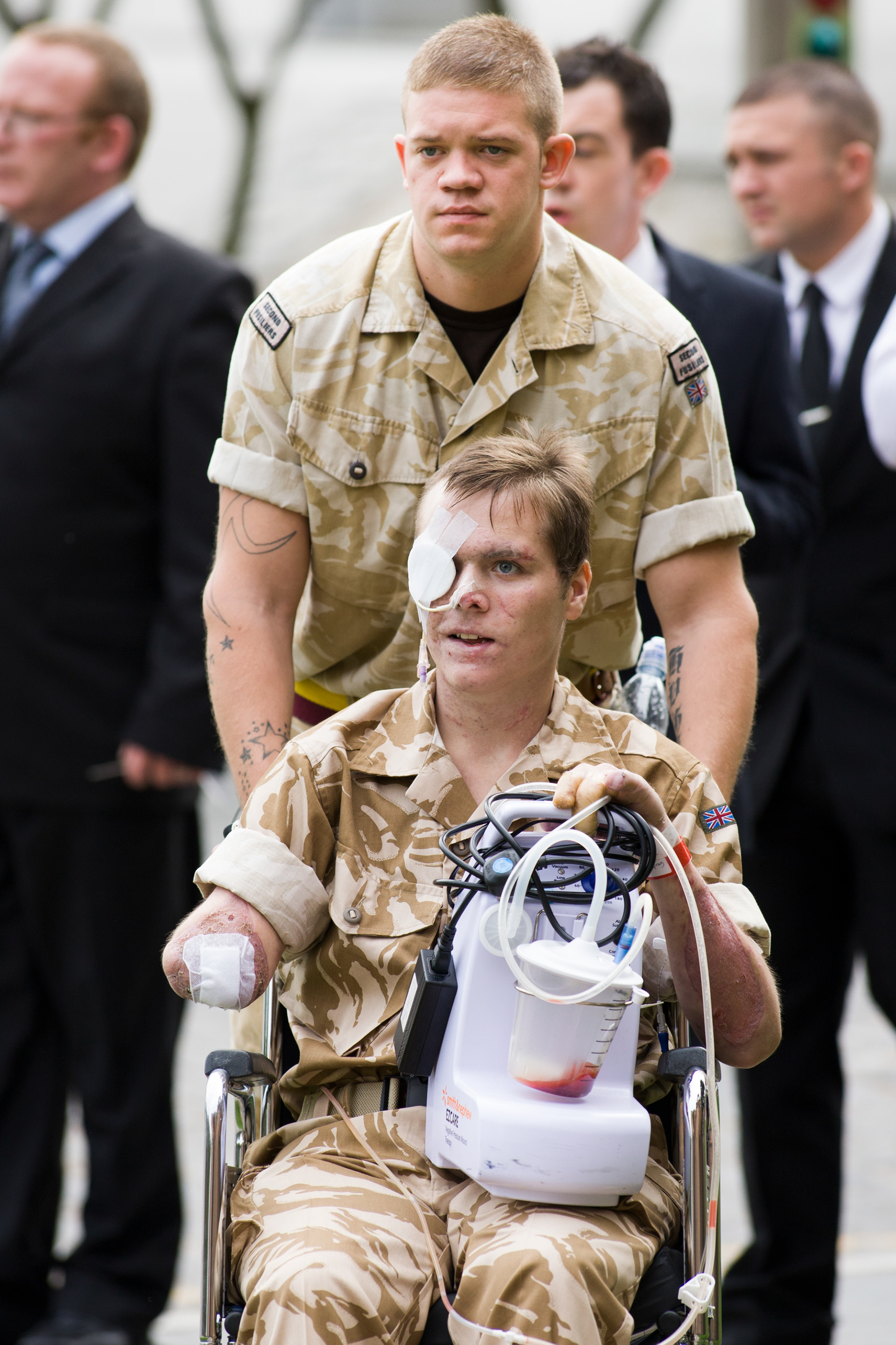 Wounded soldier at a funeral image used Daily Mail, The Sun, Daily Mirror
