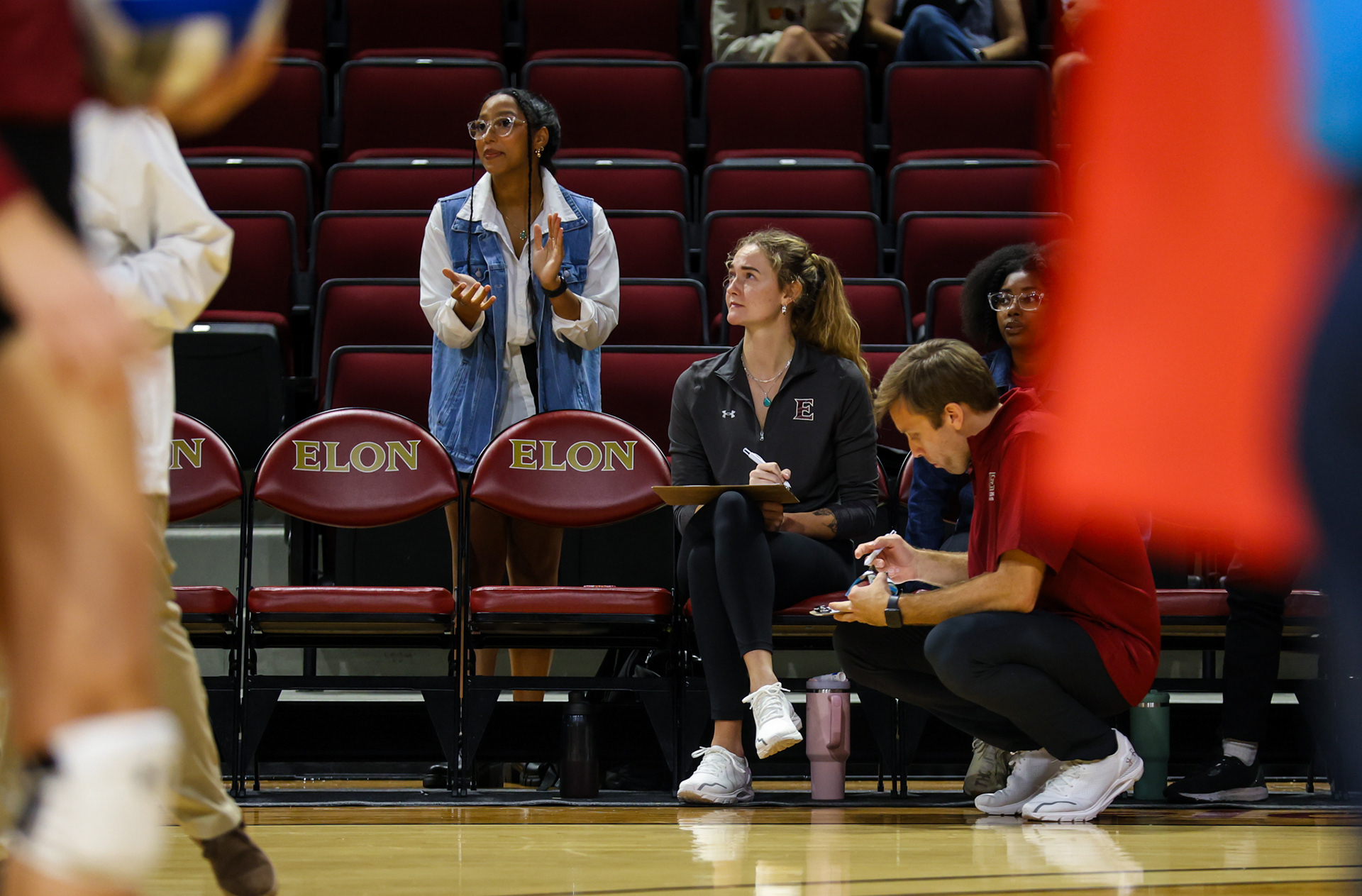 Presly Austin sits on the sideline during Elon’s match against Northeastern on Oct. 1, 2023. Photo by Jacob Kisamore.