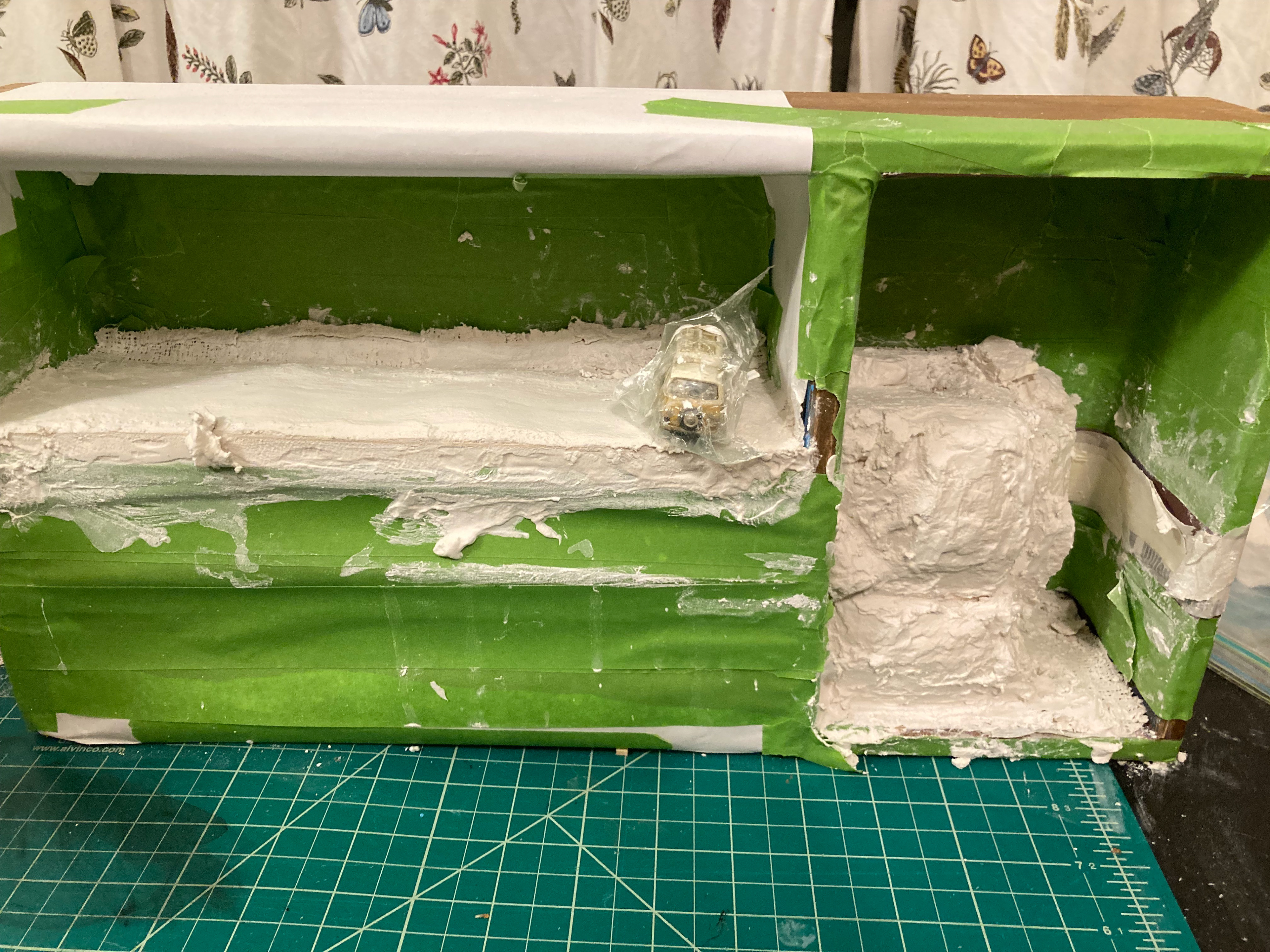 Wet on wet application of plaster on plaster works just as well or better than waiting for it to dry and messing with glues.