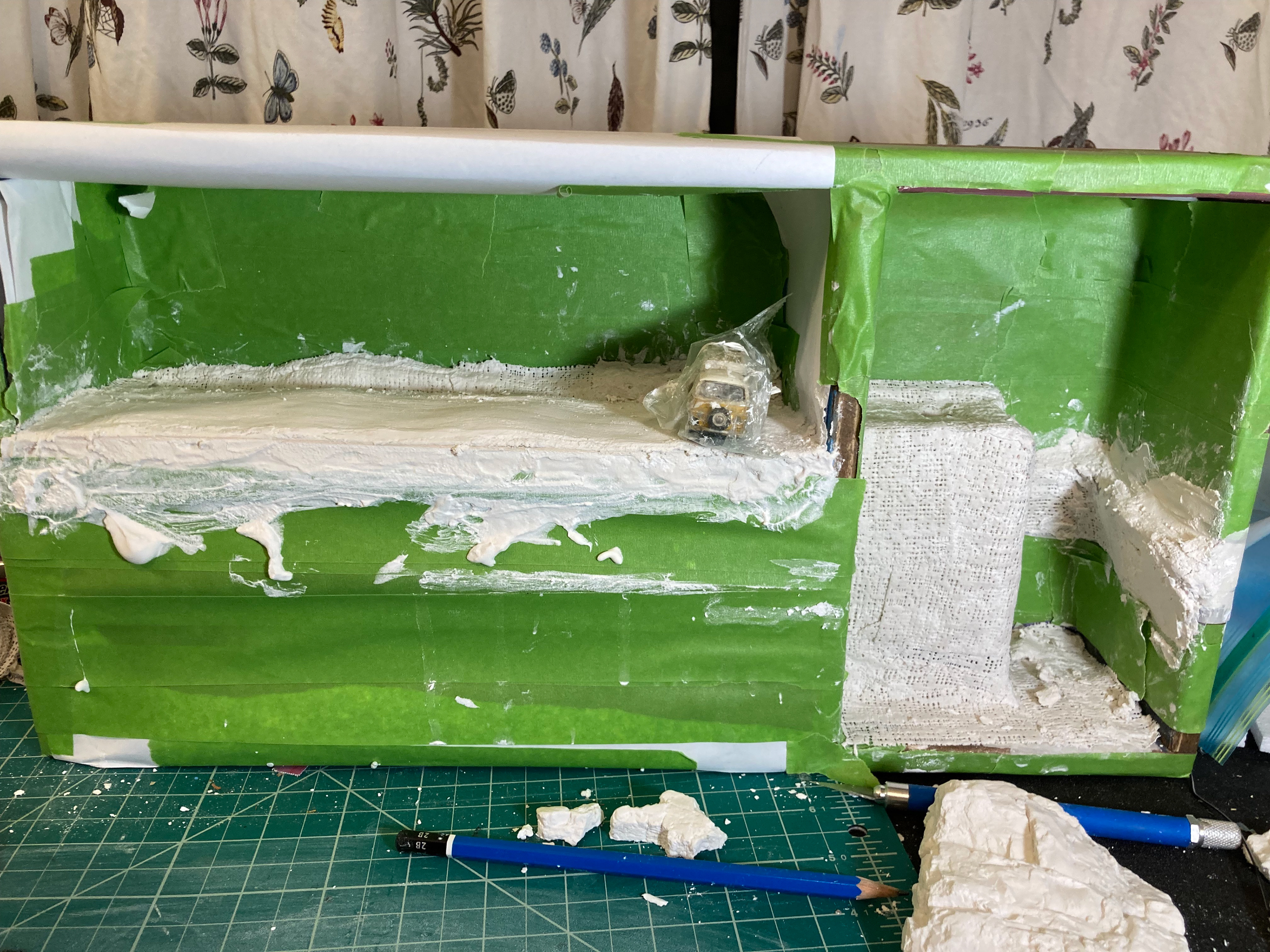 Plaster is messy but fun. It's the easiest way to make all kinds of terrain, and to make me feel like a child again.