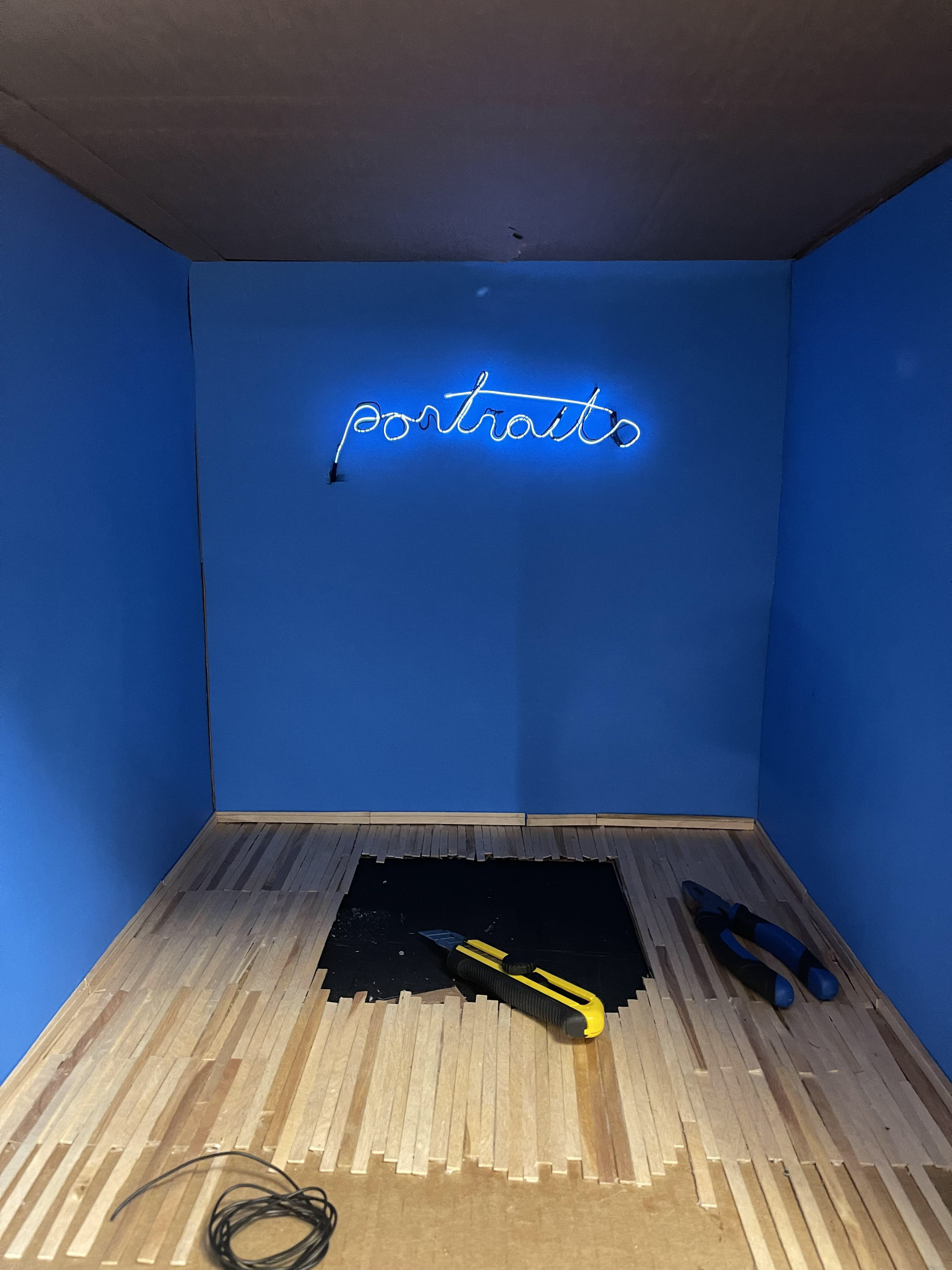 The "neon" sign was hand-shaped using EL wire. It really does glow!